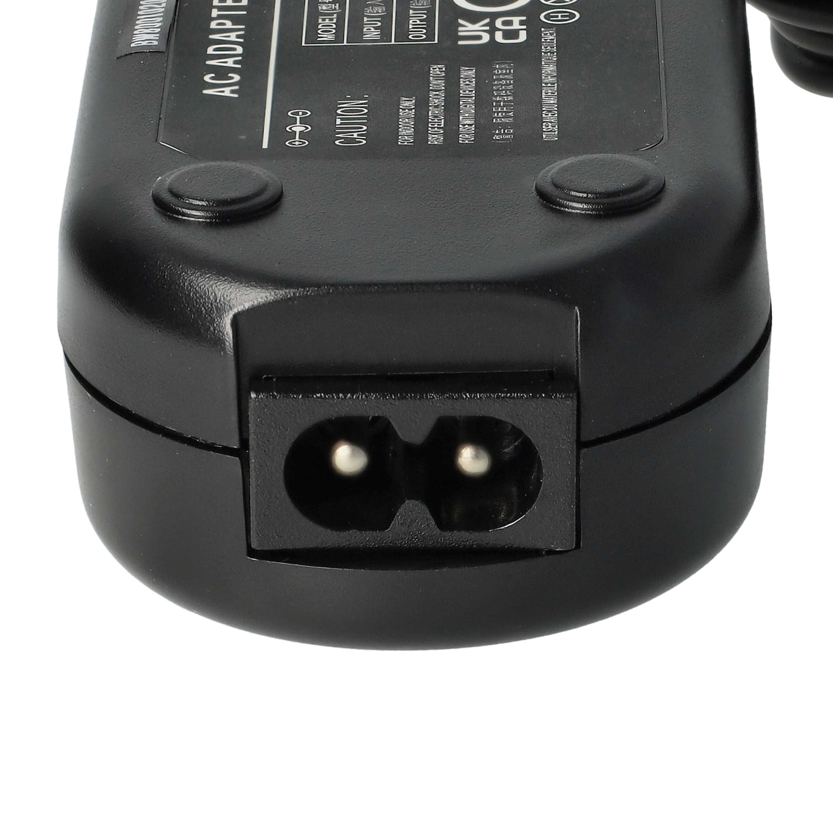 Ein schwarzes AC-Netzteil mit Zweipol-Netzstecker, auf weißem Hintergrund.