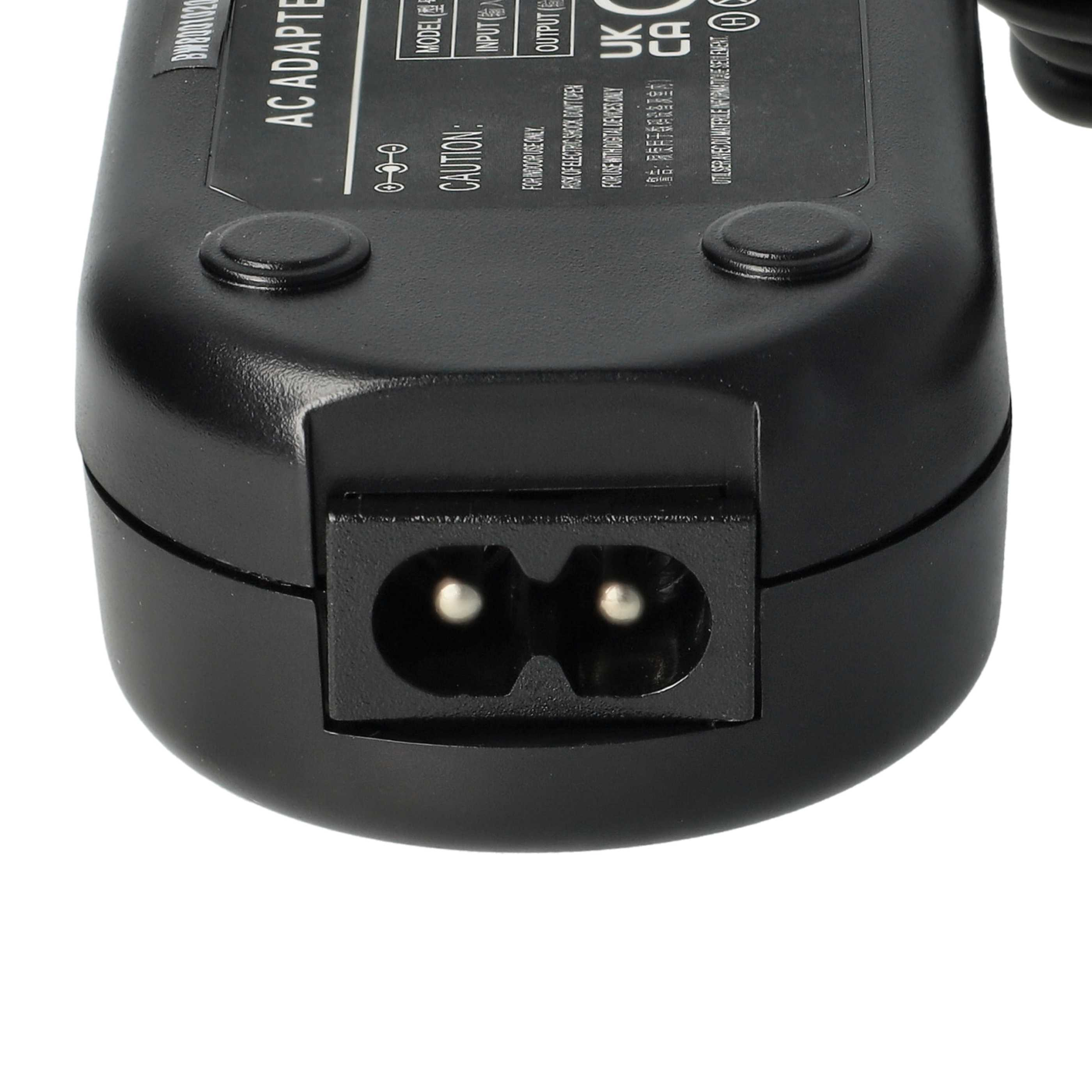 Nahaufnahme eines schwarzen AC-Adapters mit einem zweipoligen Stecker.