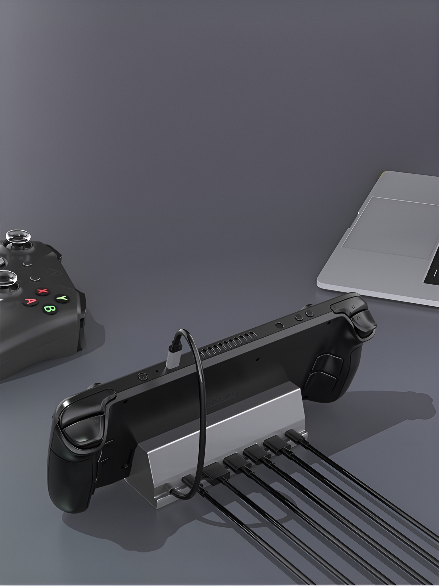 Ein Spielgerät, das mit einer Ladestation mit mehreren Kabeln verbunden ist.