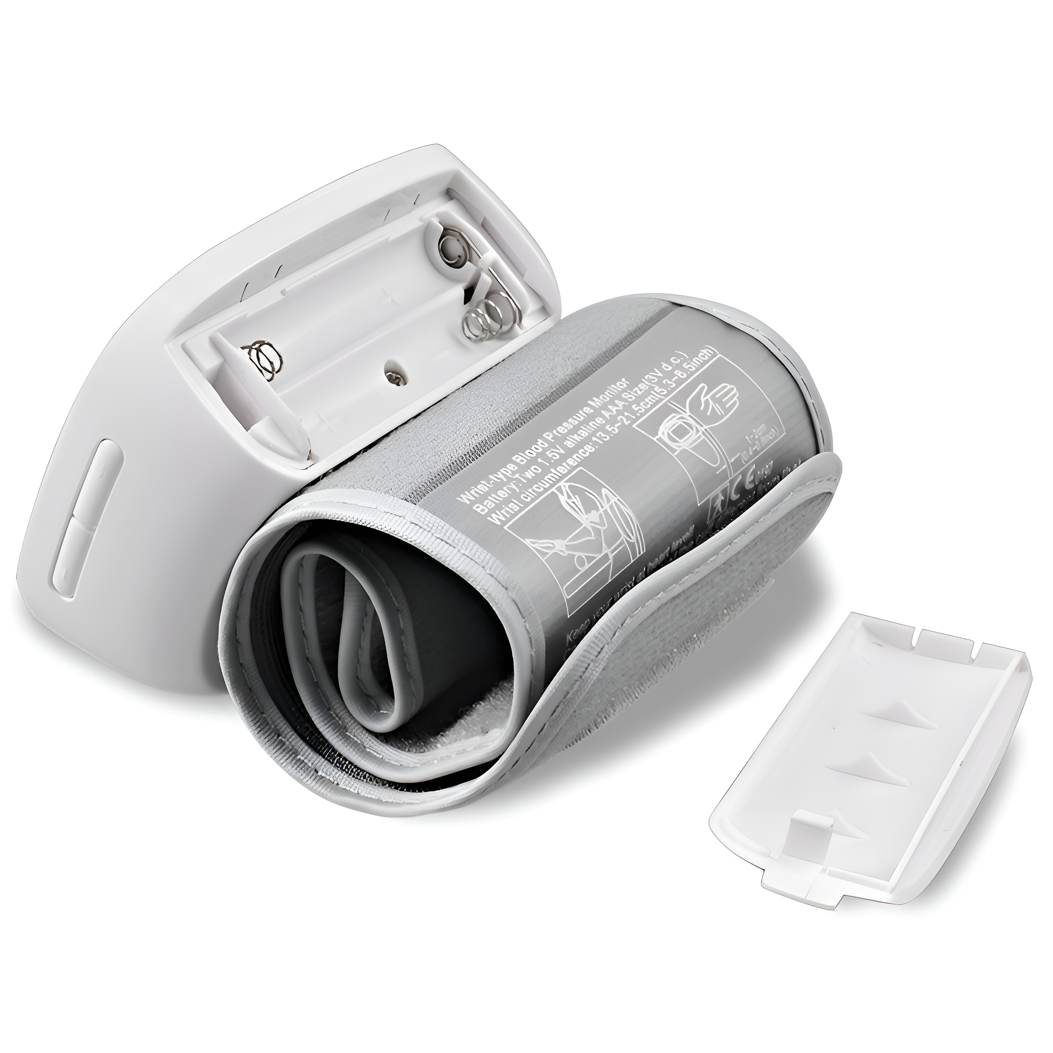 Ein weißes Blutdruckmessgerät für das Handgelenk mit abgetrenntem Batteriefach und Manschette.