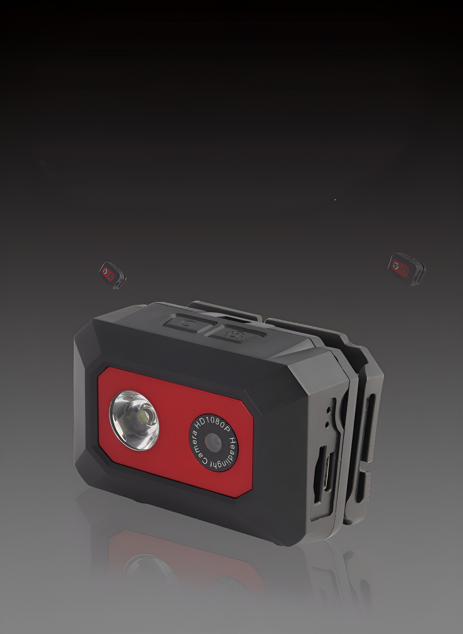 Schwarze und rote Action-Kamera mit rotem Licht. Dunkler Hintergrund.