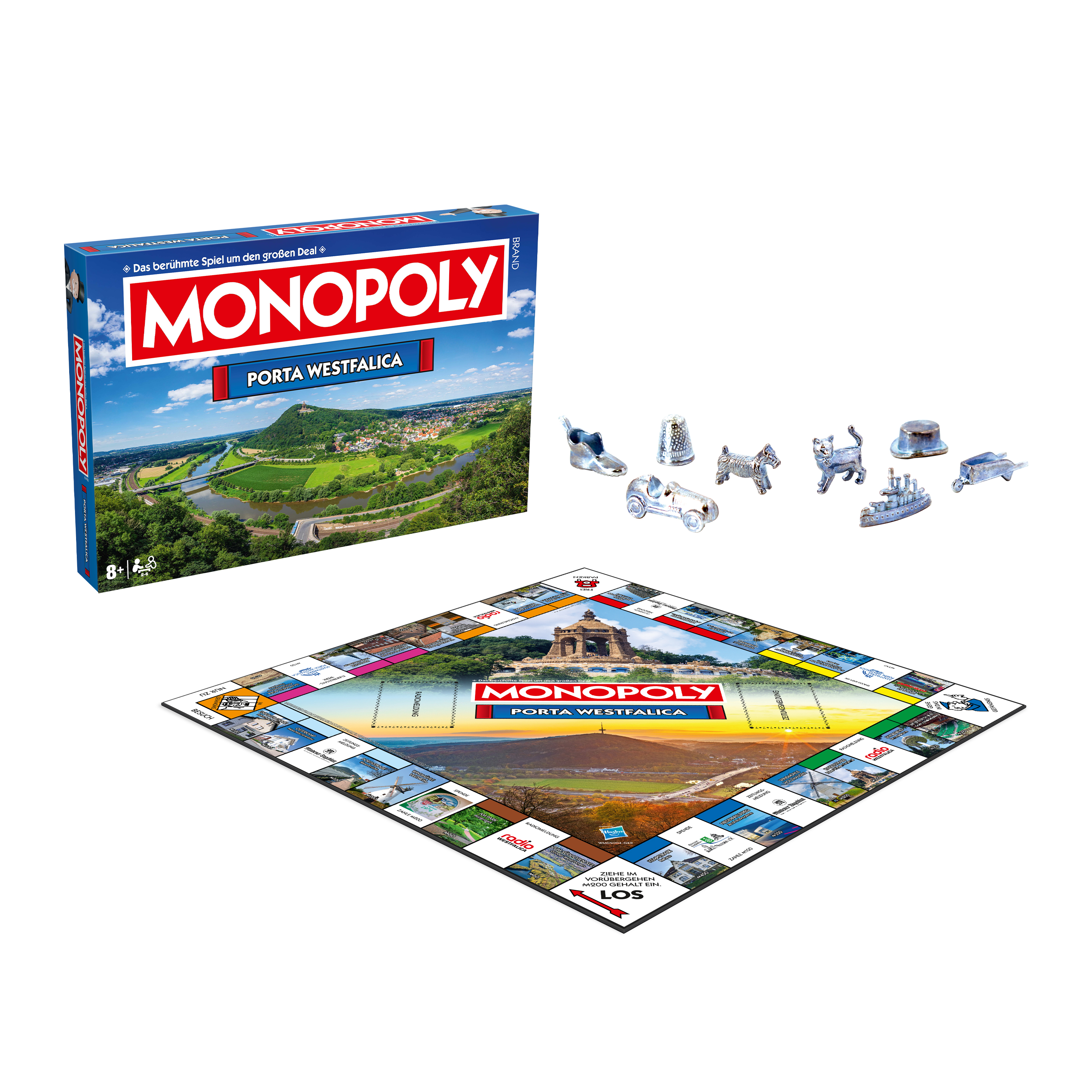 Monopoly-Brettspiel. Brett und Spielfiguren sichtbar. Box mit Porta Westfalica-Bild.