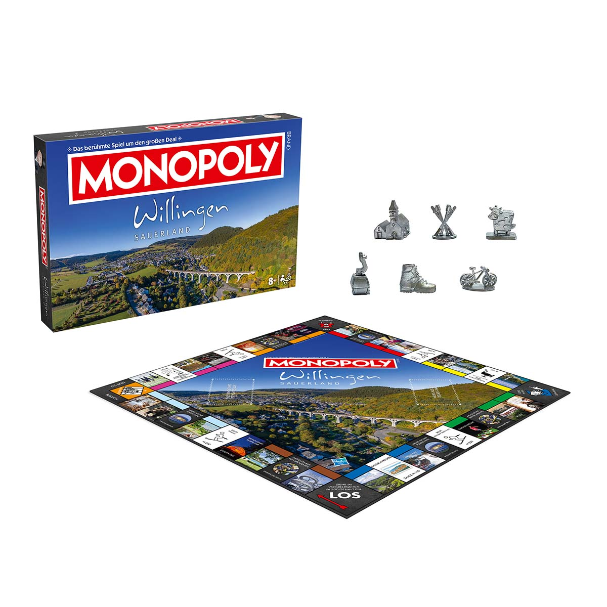 Monopoly-Spielbox und -Spielbrett. Verschiedene Spielsteine sind um das Brett angeordnet.