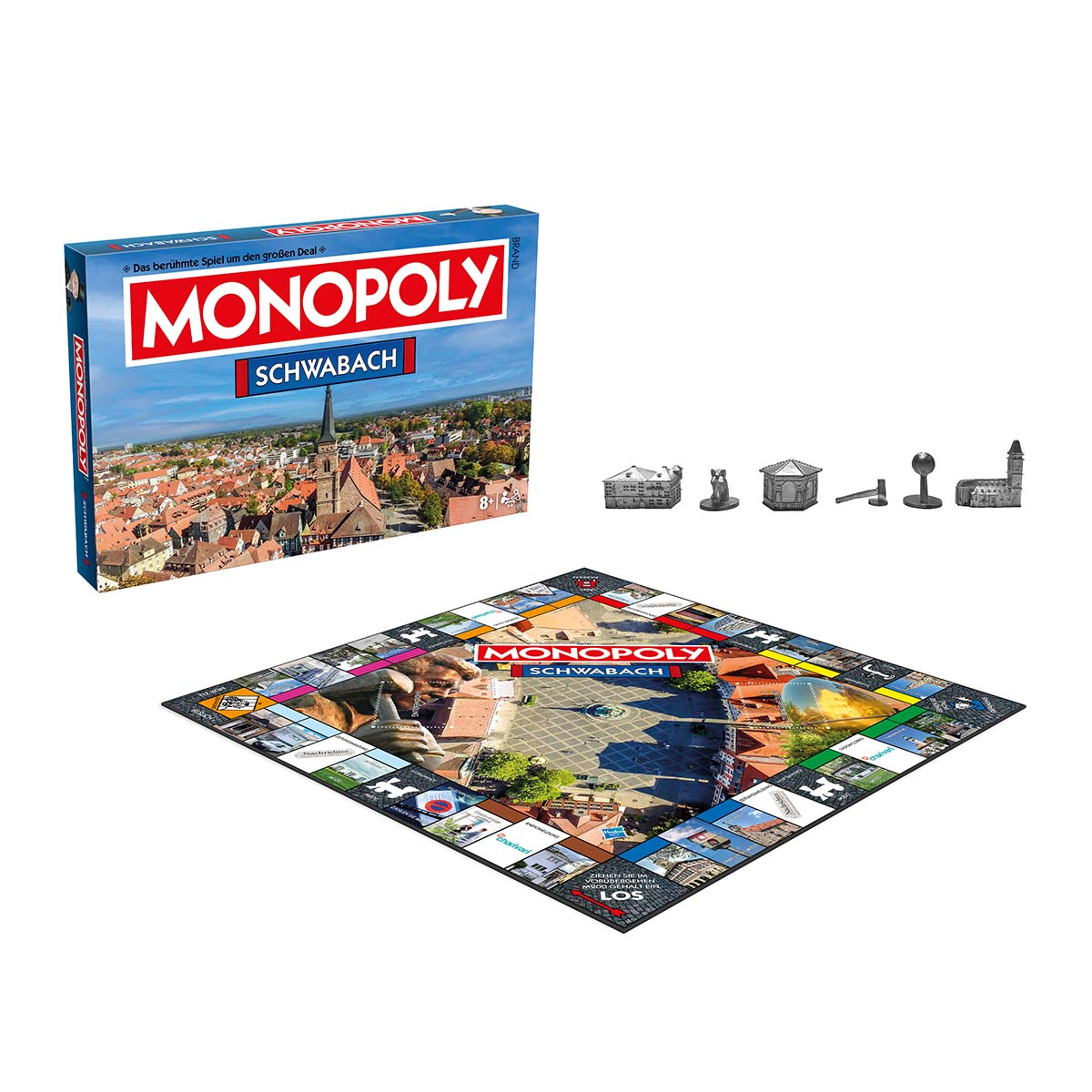 Monopoly-Brettspielbox mit Stadtansicht und Spielfiguren auf einem Brett.
