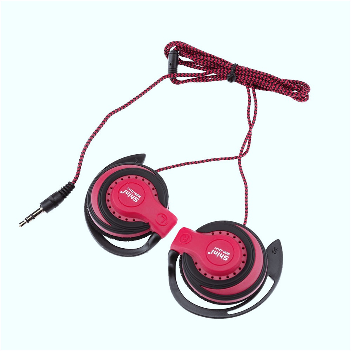 Rote und schwarze Kopfhörer mit rotem Kabel. Weißer Hintergrund.