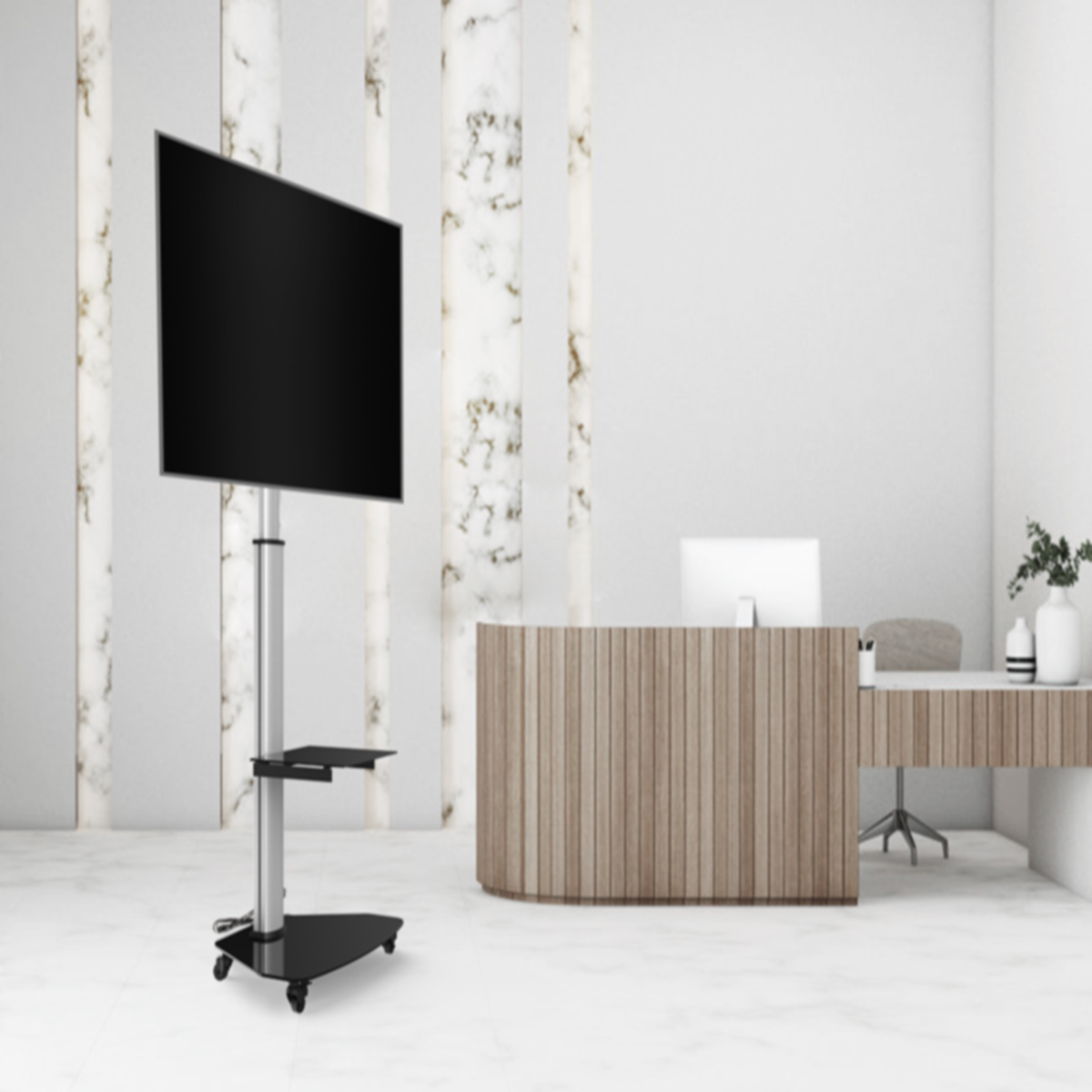 Een hoge tv-standaard met een groot zwart scherm in een moderne witte ruimte.