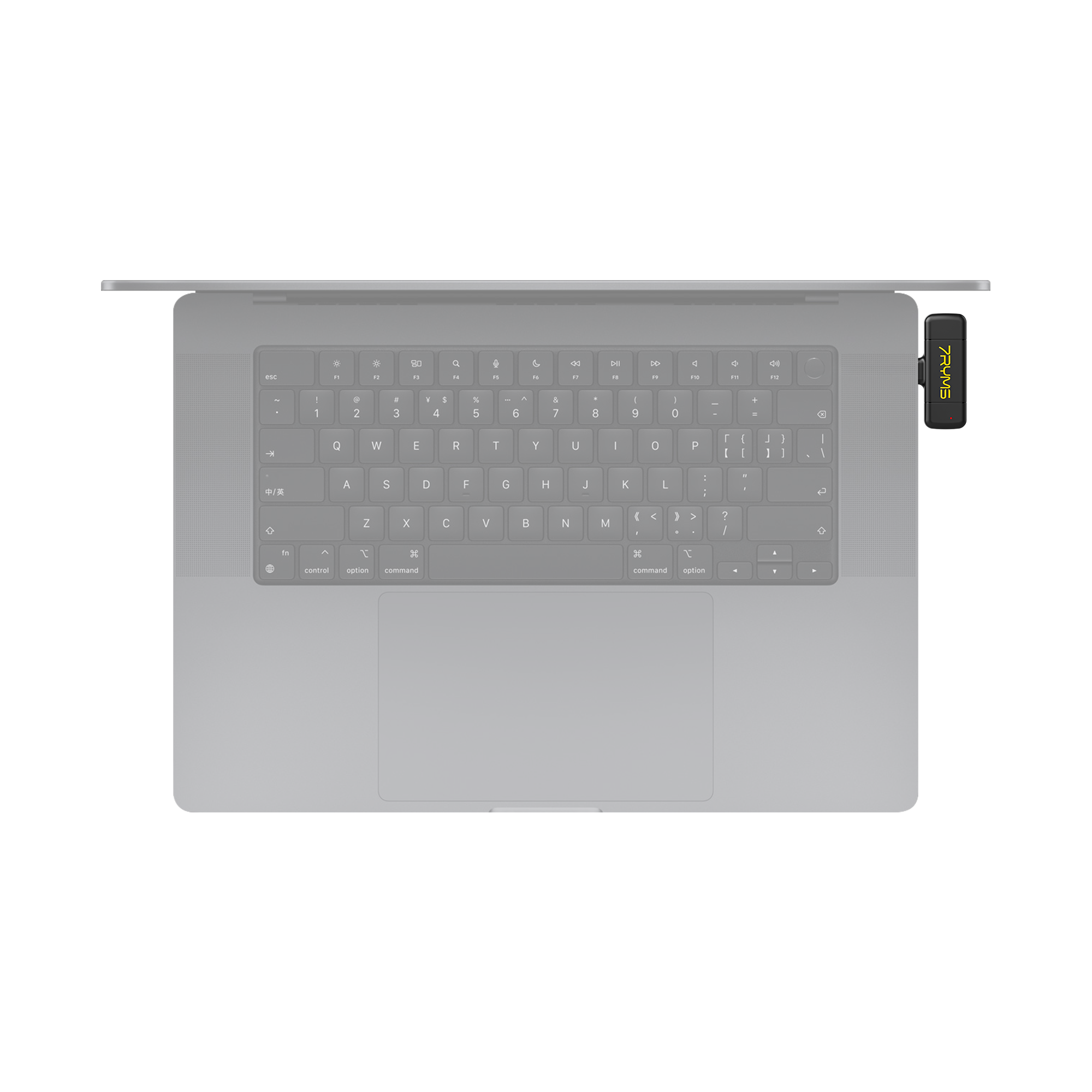 Laptop mit angeschlossenem USB-Dongle. Draufsicht. Grauer Laptop, schwarzer Dongle.