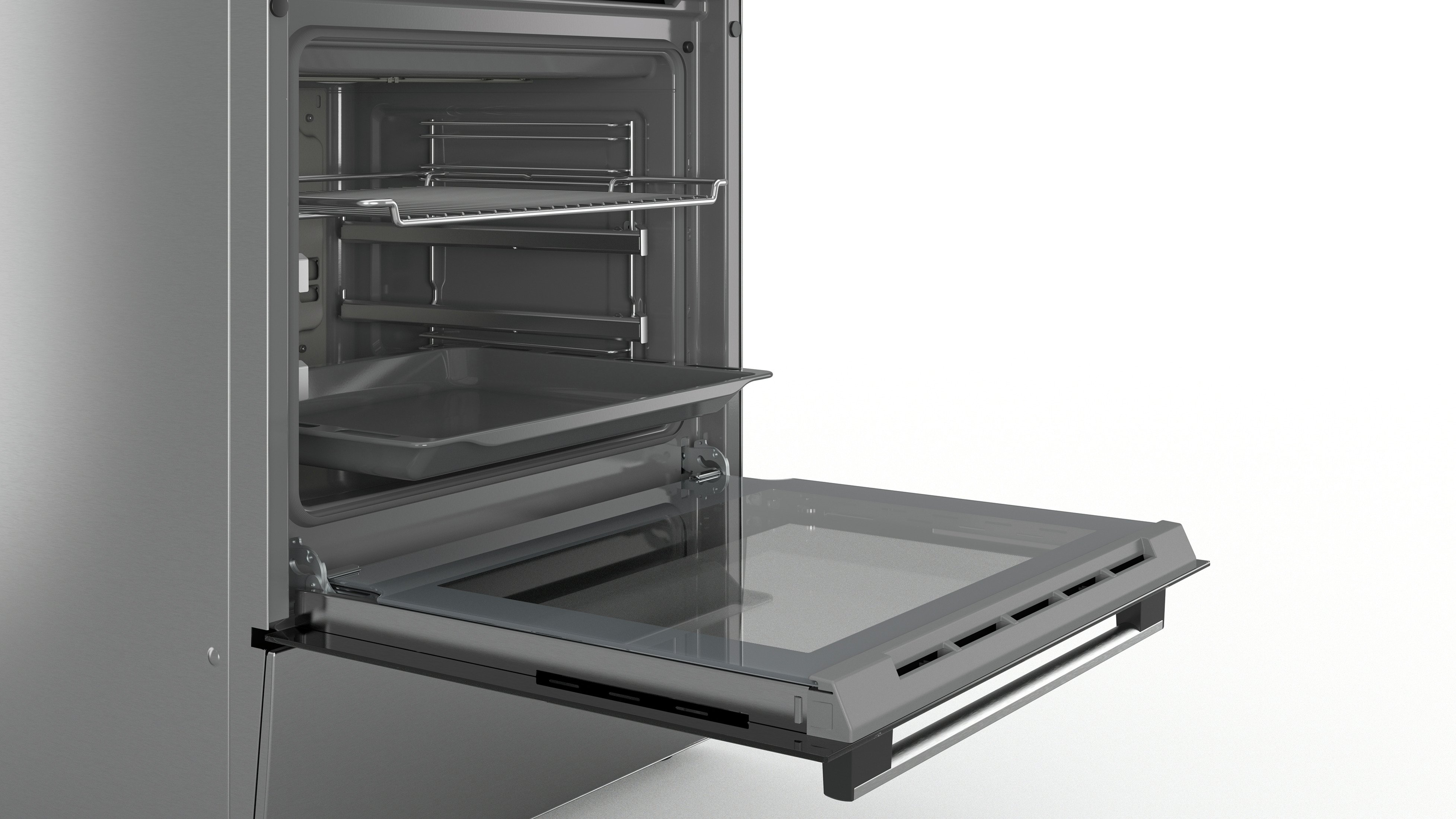 Een open oven met planken en een bakplaat erin.