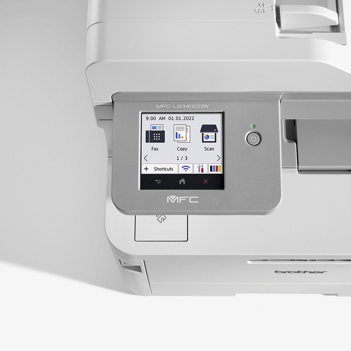 Close-up van het bedieningspaneel van een Brother printer. Het scherm toont opties voor faxen, kopiëren en scannen.