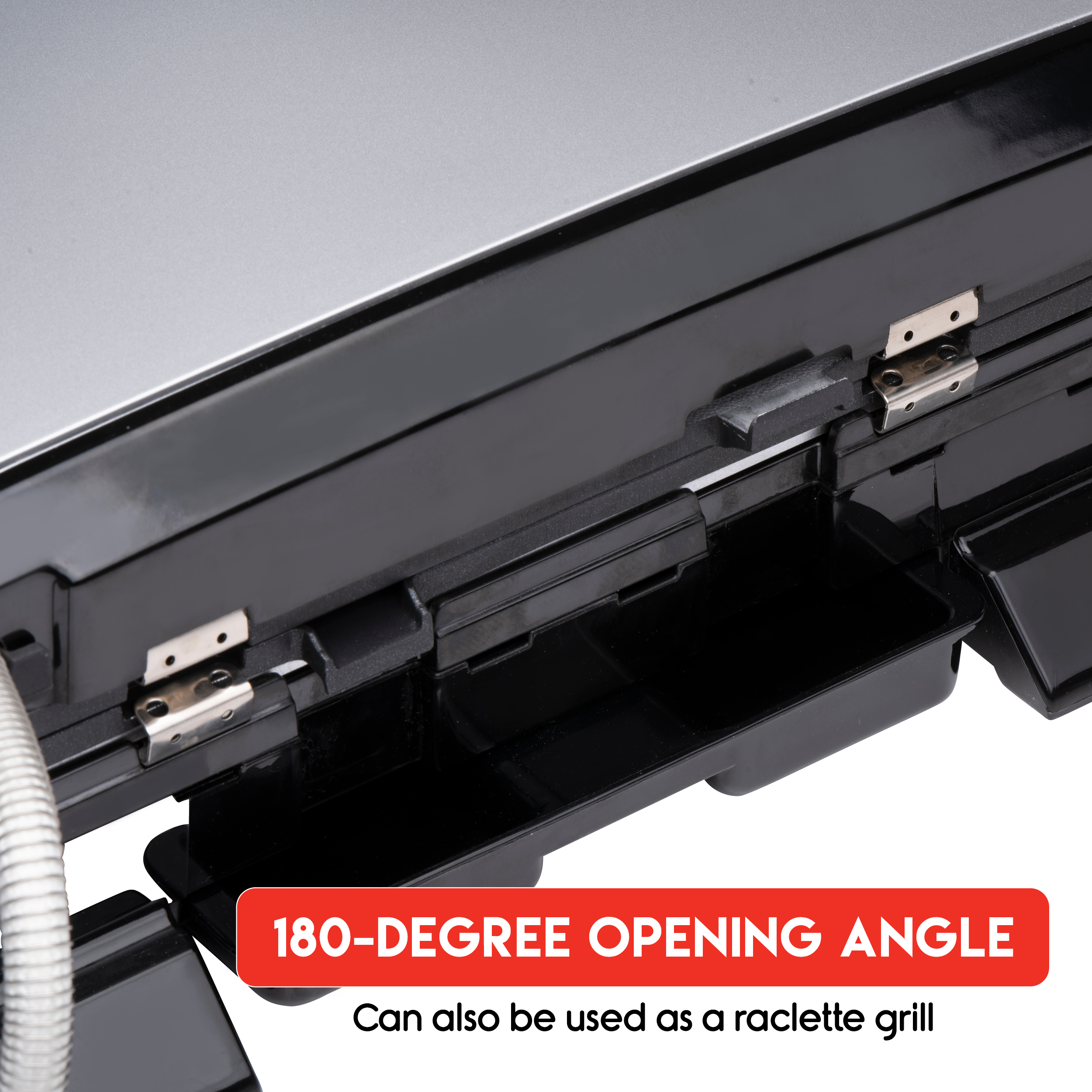 Close-up of a black griddle with a 180-degree opening angle, can also be used as a raclette grill.