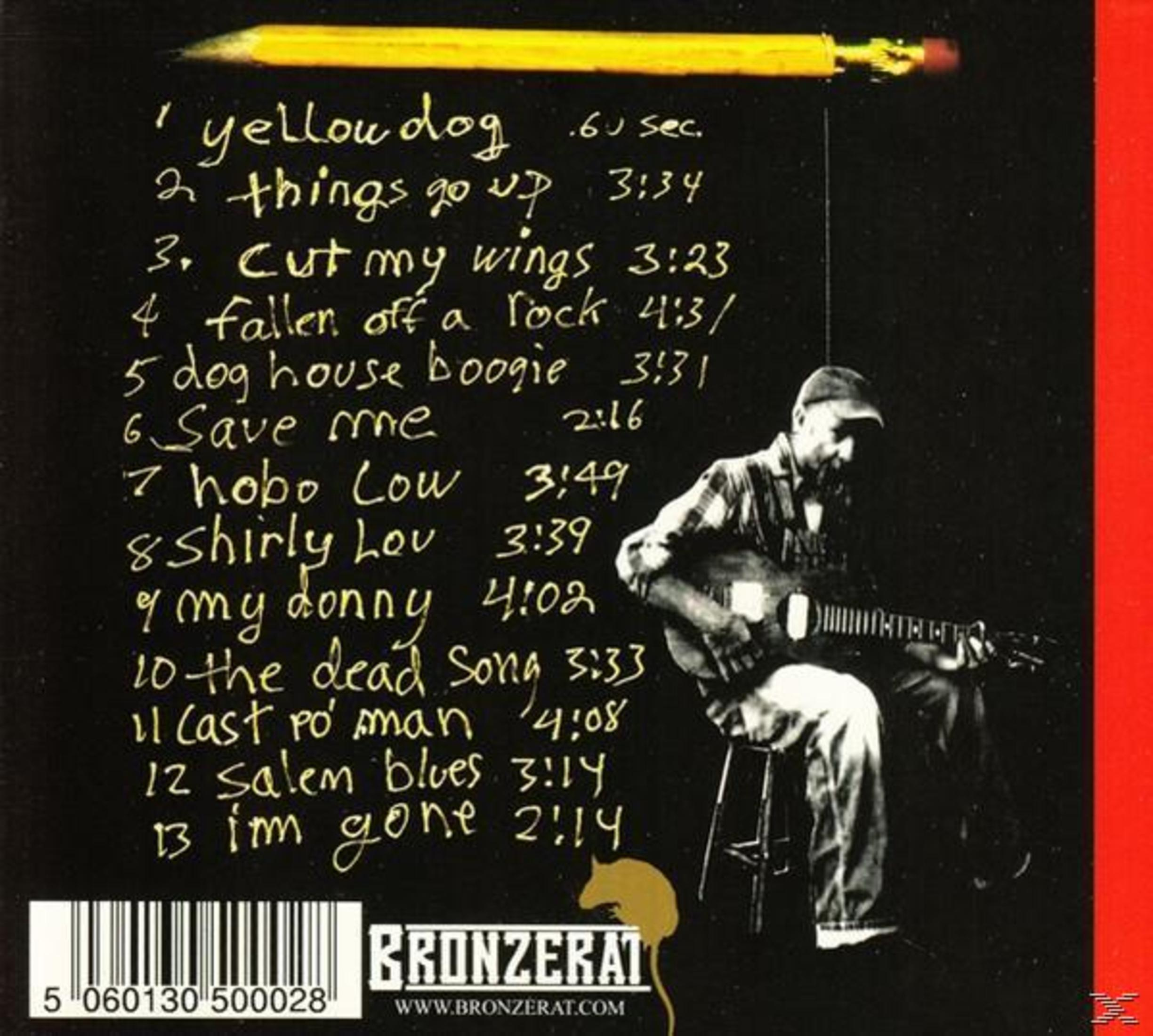 Pochette d'album avec une liste de titres manuscrite. Un homme avec une guitare est à droite.