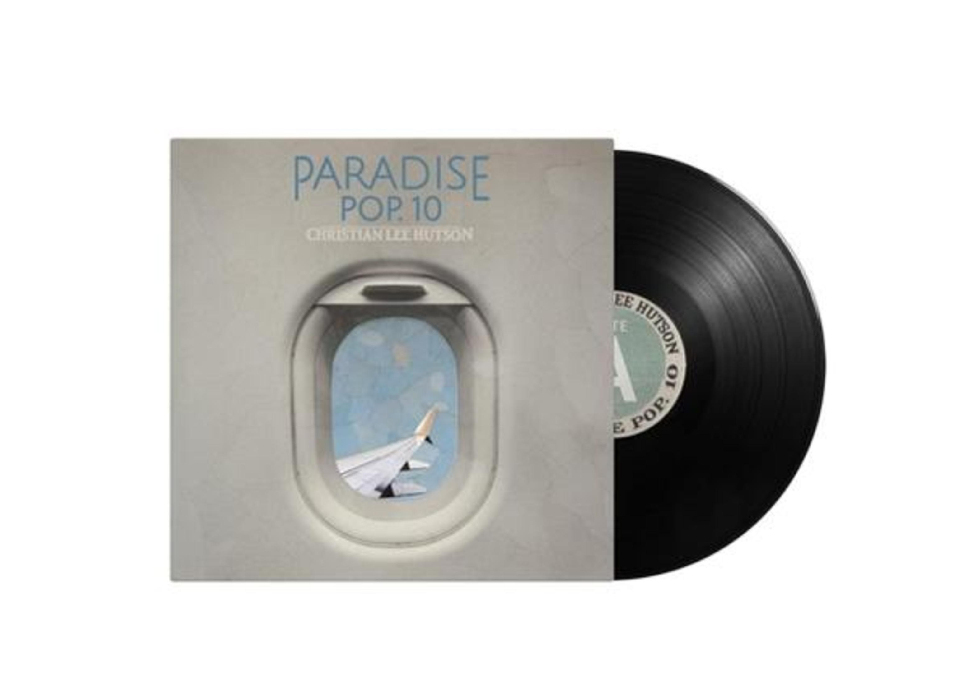 Copertina dell'album che mostra un disco in vinile e una copertina con vista da un finestrino dell'aereo.
