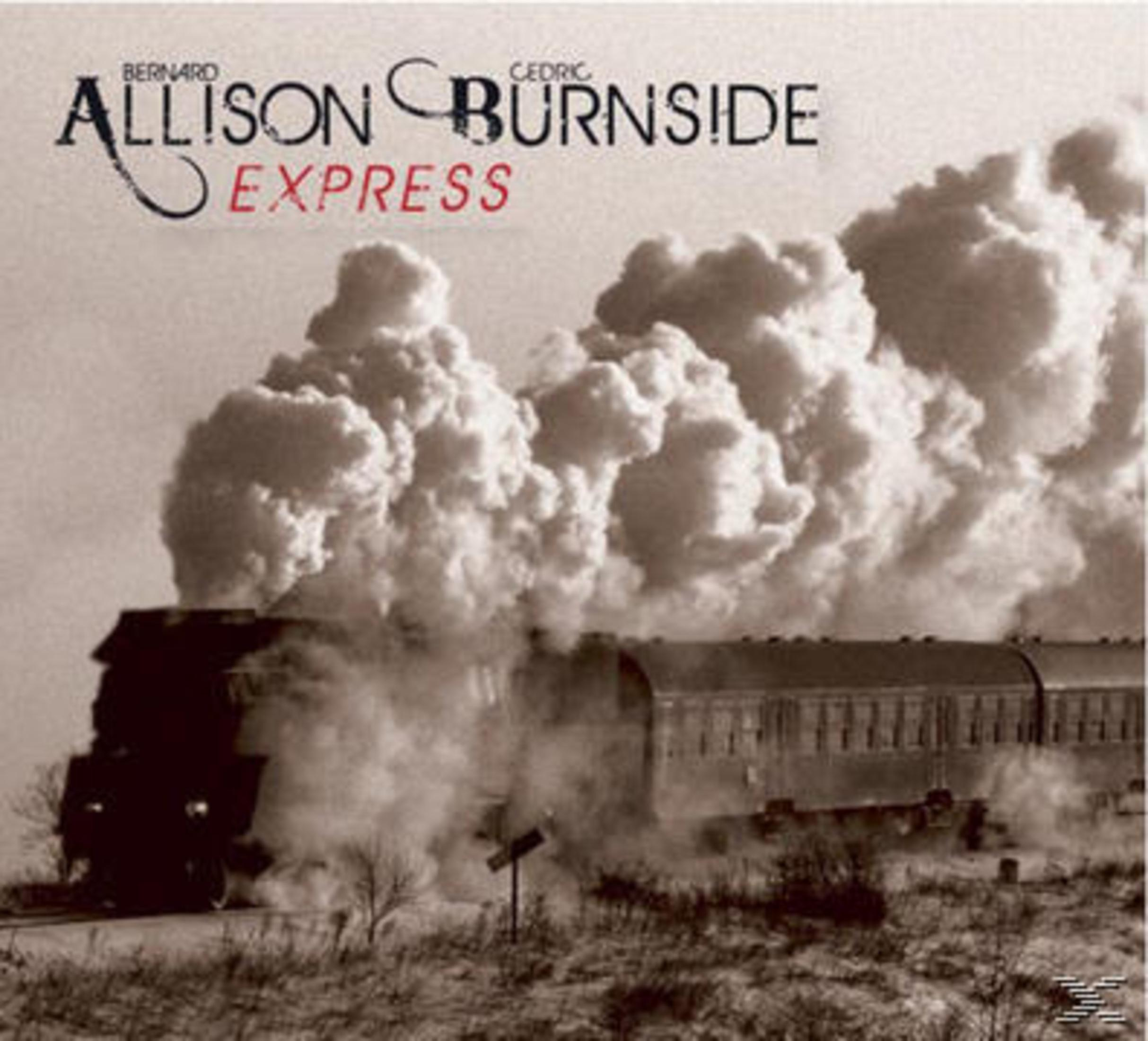 Albumhoes met een sepia-tint. Een trein met grote rookwolken voor een bewolkte achtergrond.