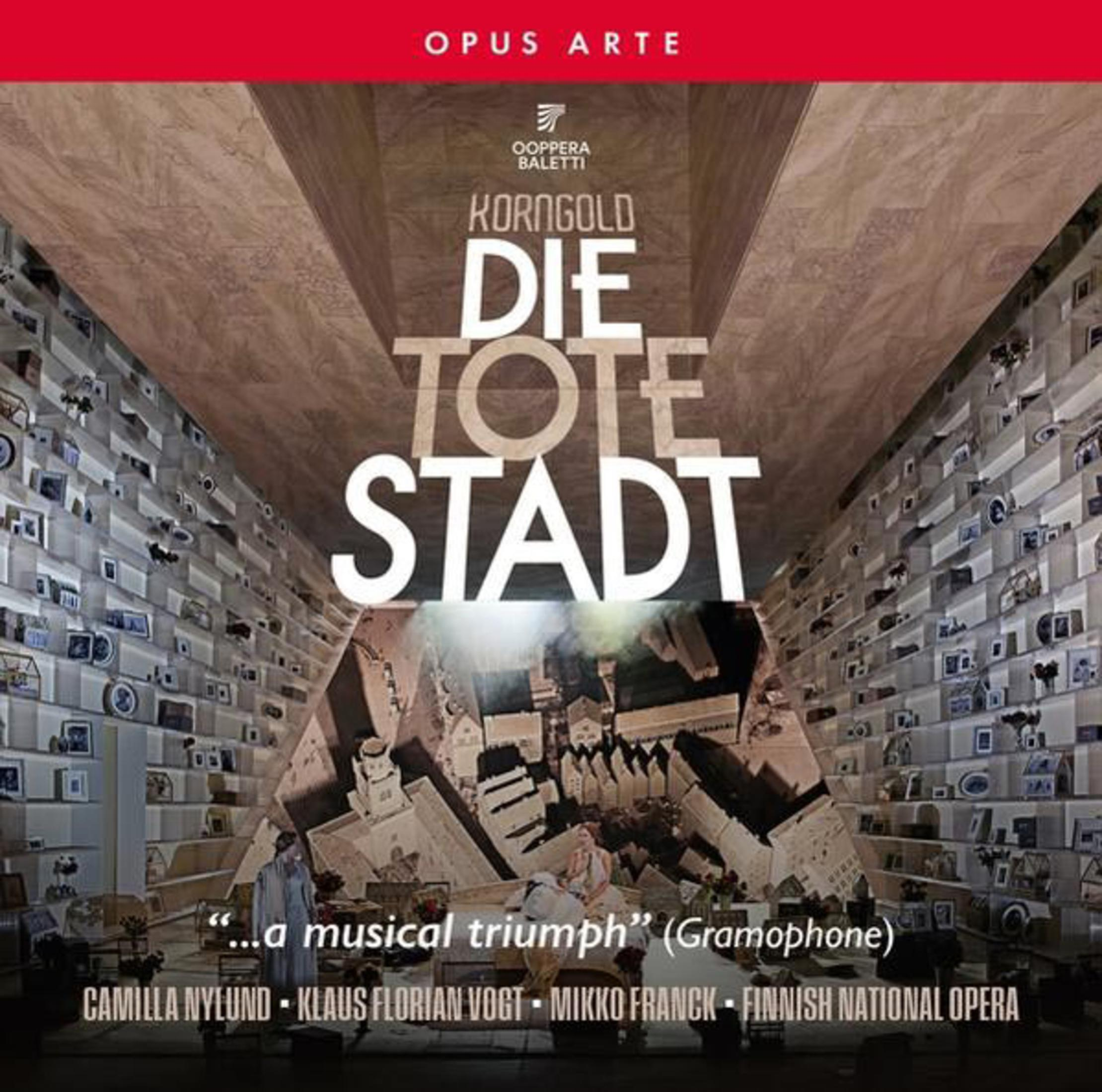 Albumhoes voor 'Die Tote Stadt'. Operascène met decor, tekst en uitvoerders.