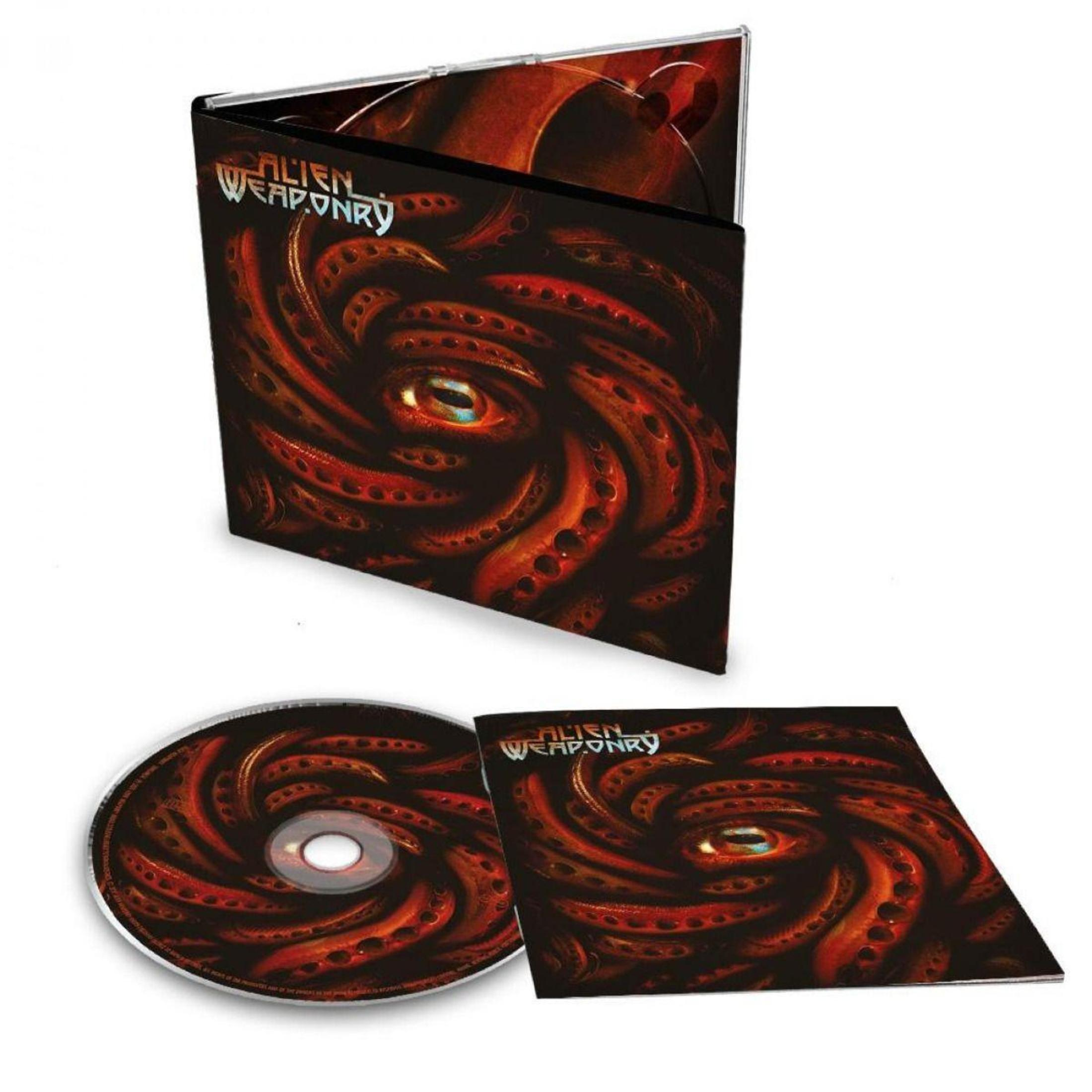 Pochette d'album avec un motif en spirale rouge et noir. Un CD et un étui sont placés. Le texte 'Alien Weaponry' est affiché.