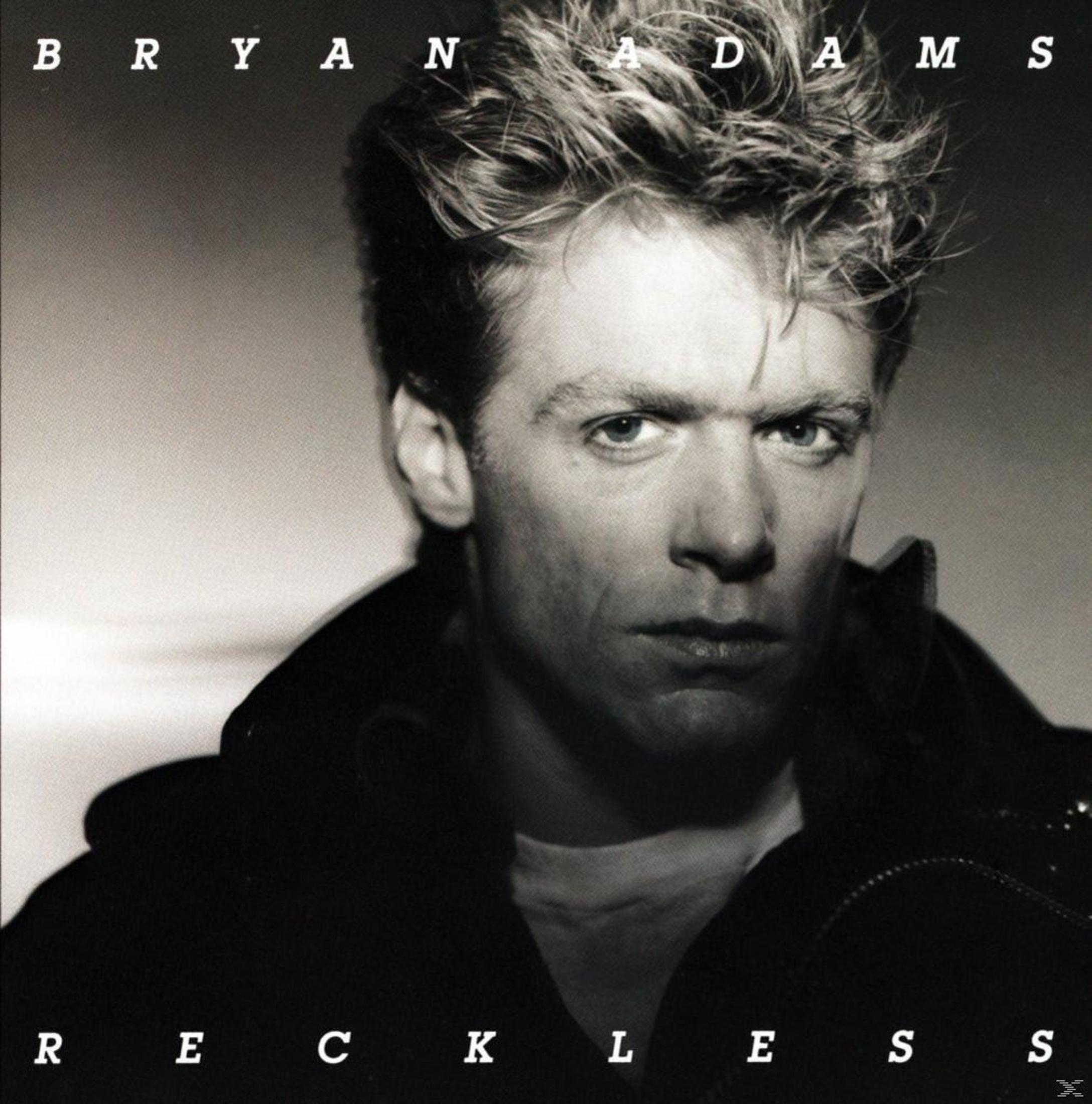 Copertina dell'album con il volto di Bryan Adams in bianco e nero, testo 'Reckless' in basso.