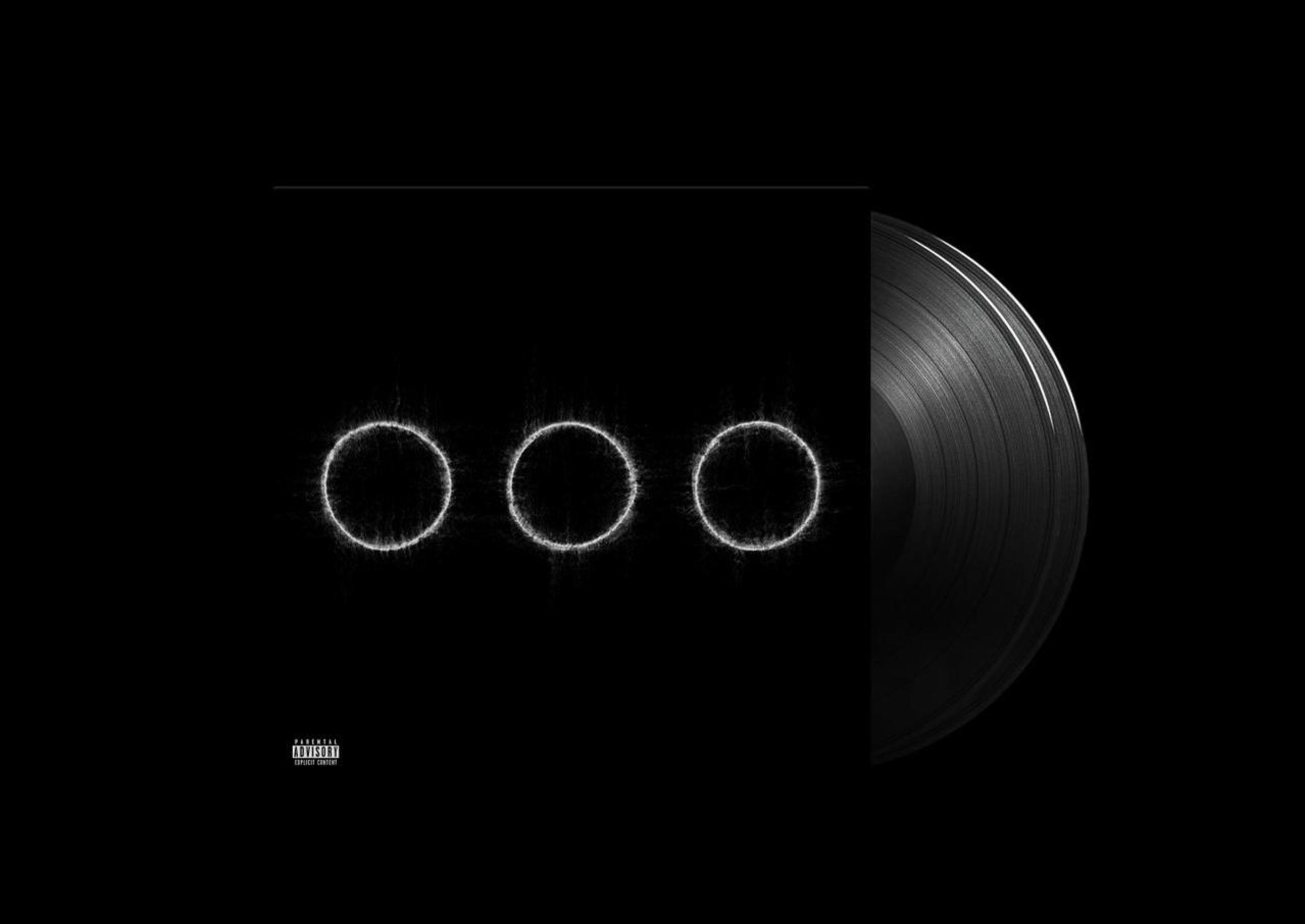 Albumhoes: Drie witte cirkels op een zwarte achtergrond, met een vinylplaat rechts.