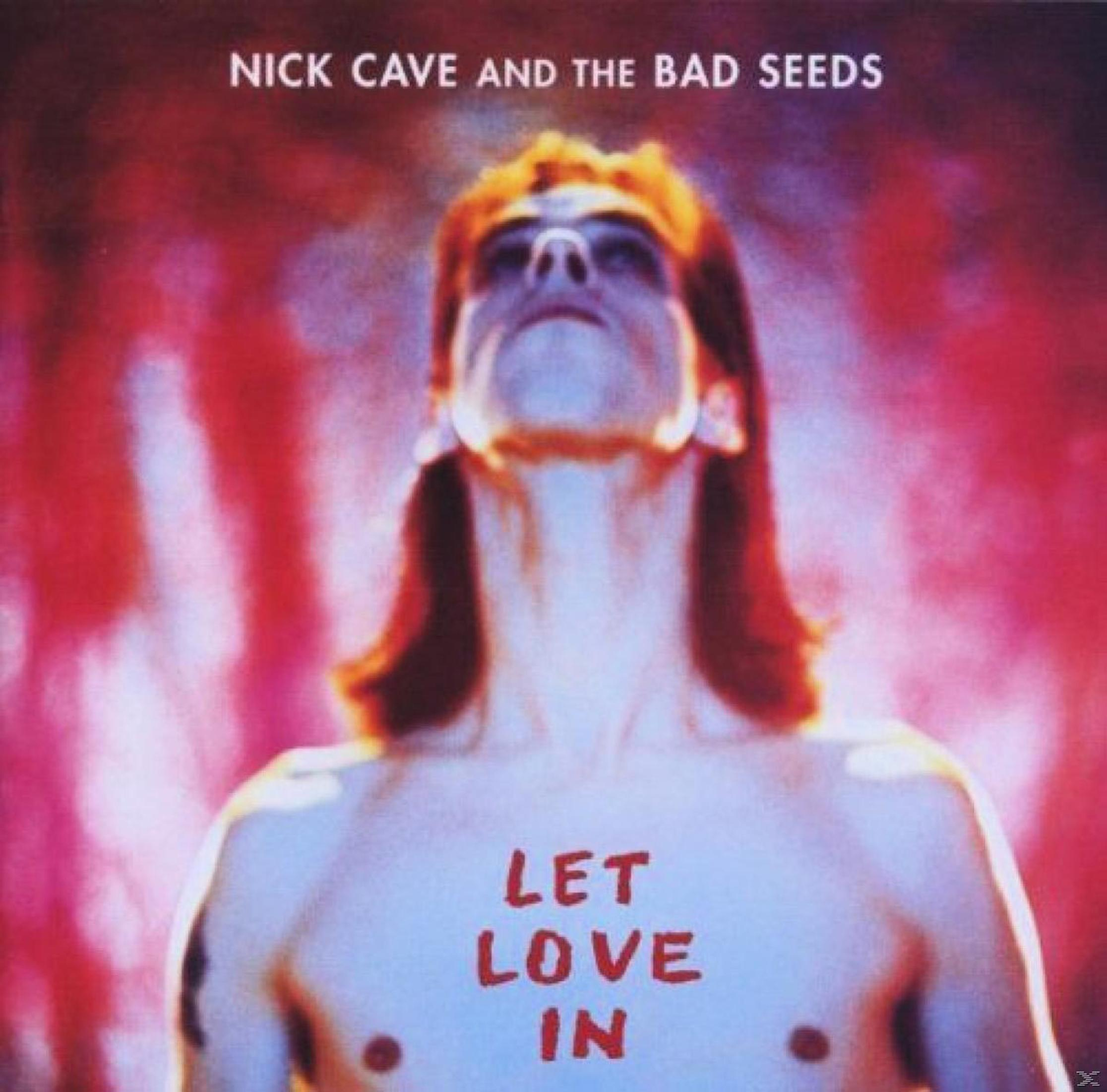 Albumhoes: Een man met ontbloot bovenlijf met de woorden 'LET LOVE IN' in het rood. Tekst: Nick Cave.