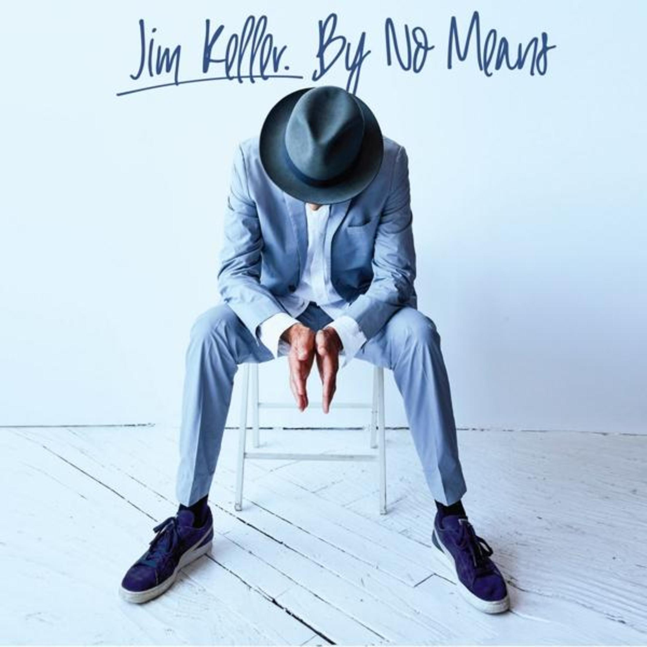 Pochette d'album avec un homme portant un chapeau, assis sur une chaise. Le fond est blanc.