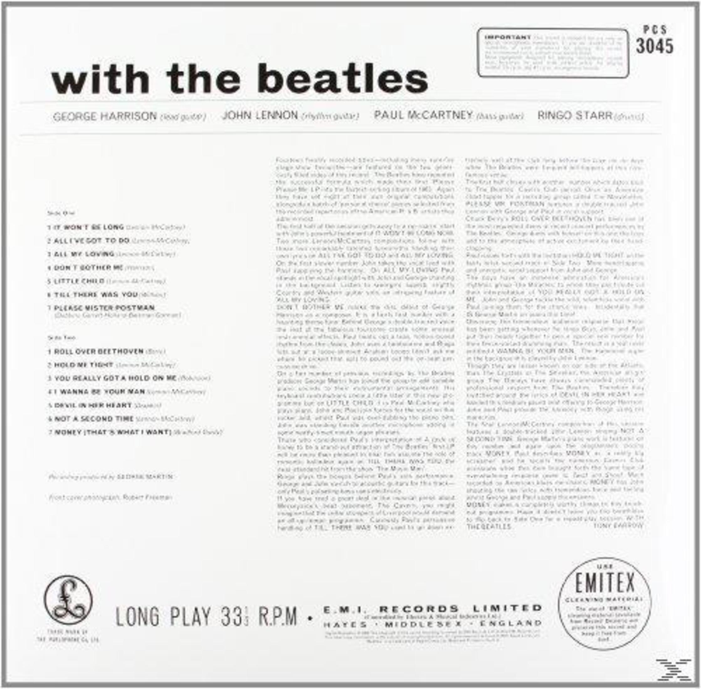 Retro dell'album dei Beatles, testo bianco su sfondo bianco, elenco dei brani e testo.