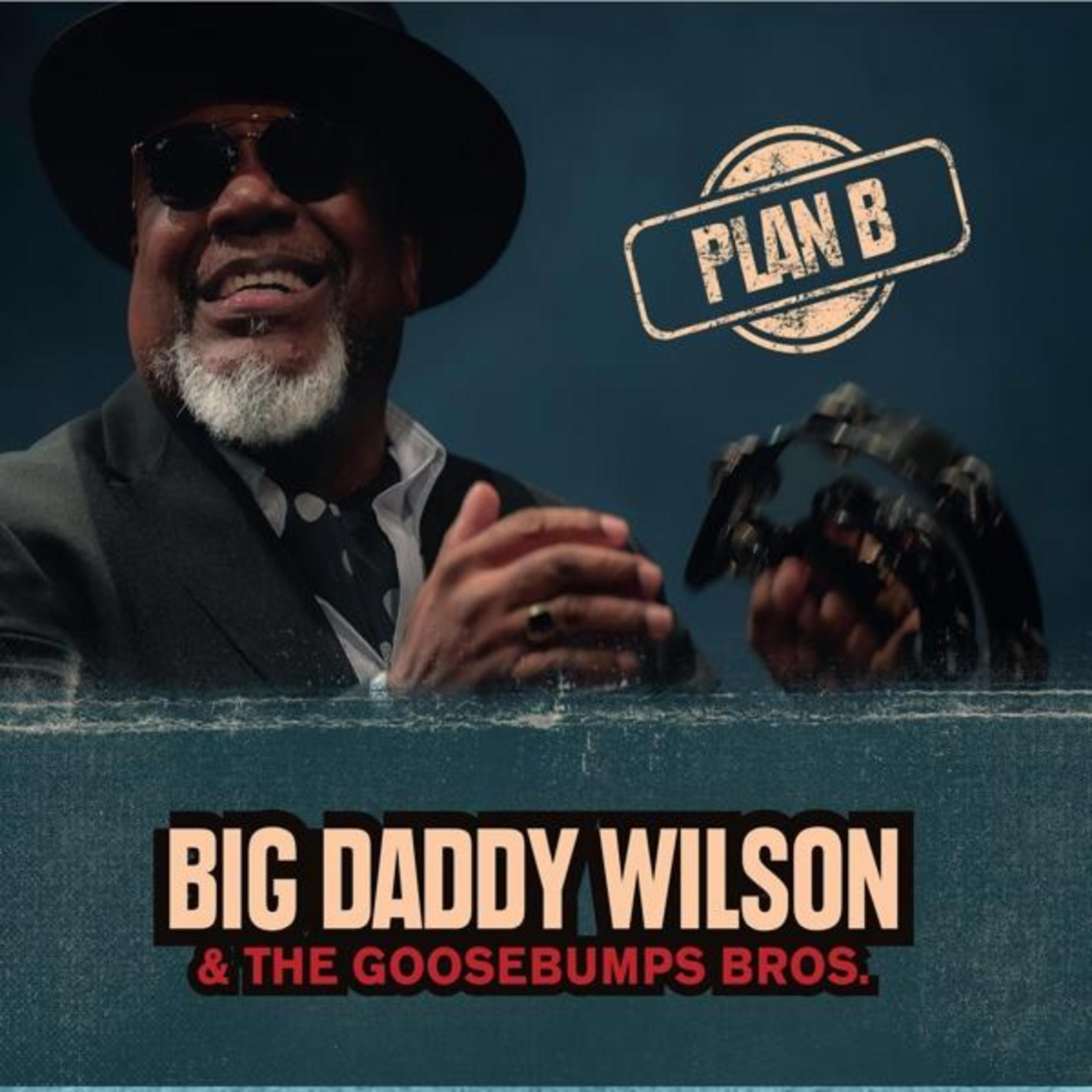 Albumhoes, Big Daddy Wilson lachend, Plan B stempel, en een blauwe achtergrond met tekst.