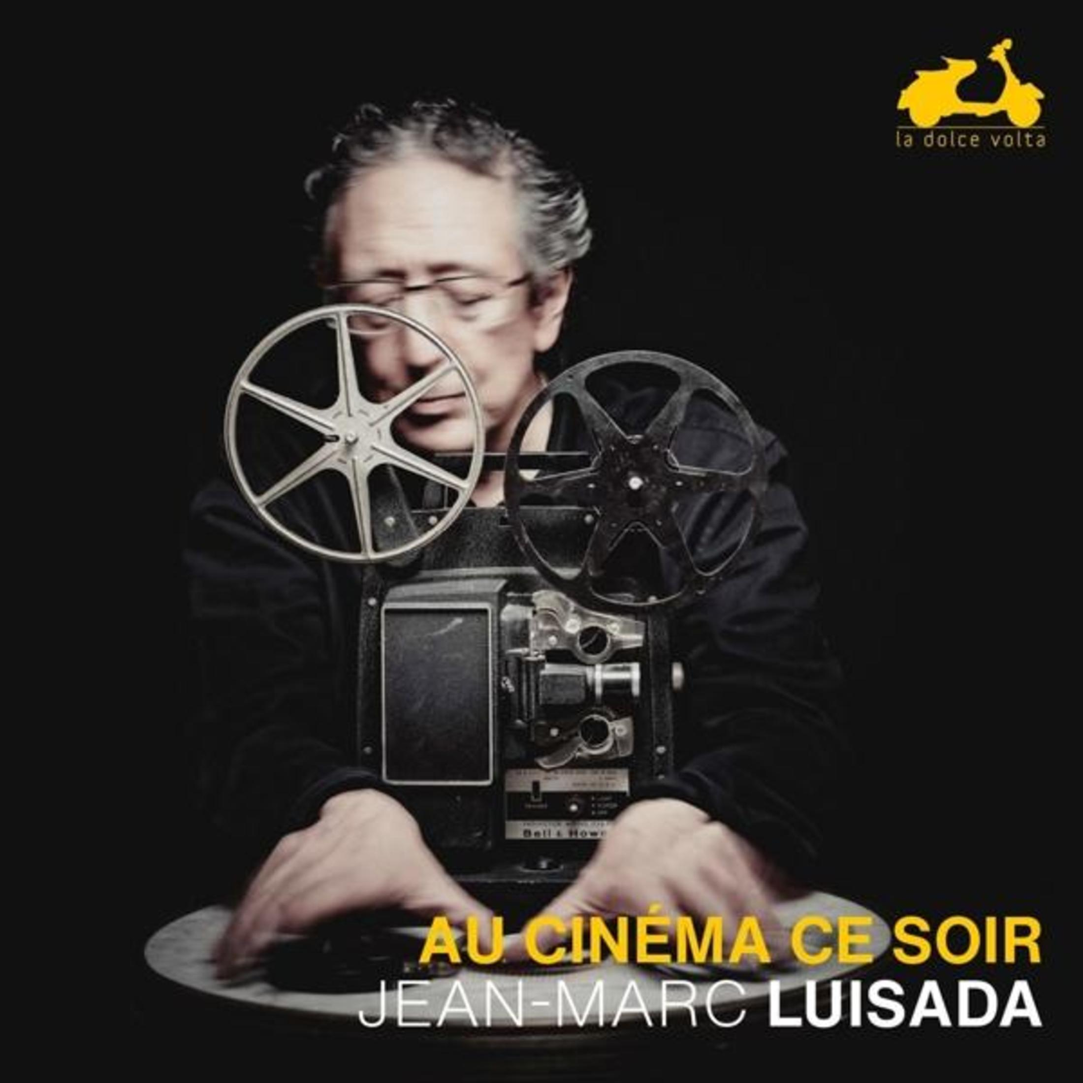 Een man met een bril die filmrollen hanteert met de albumtitel eronder.