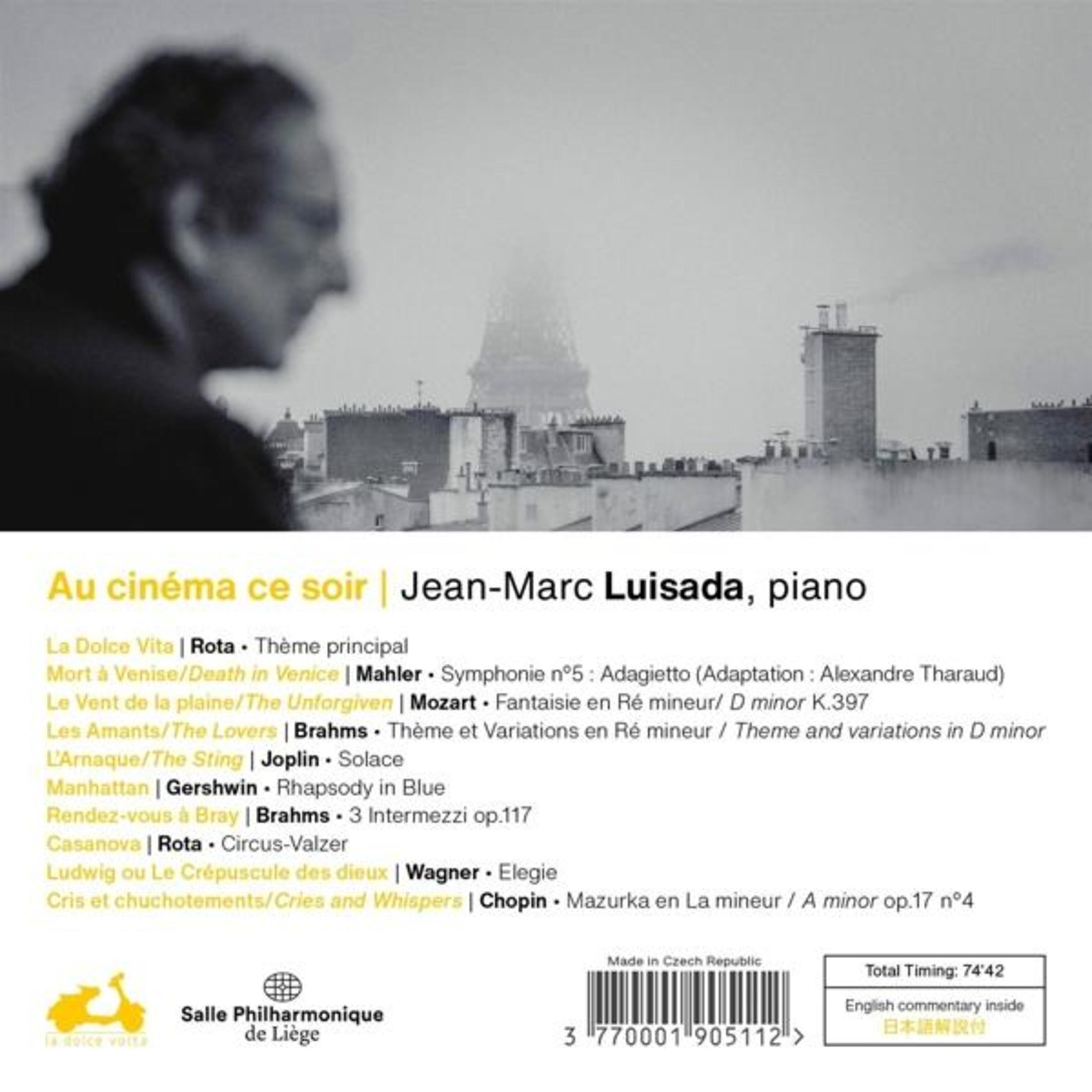 Achterkant van album met silhouet van man en uitzicht op stad met toren.