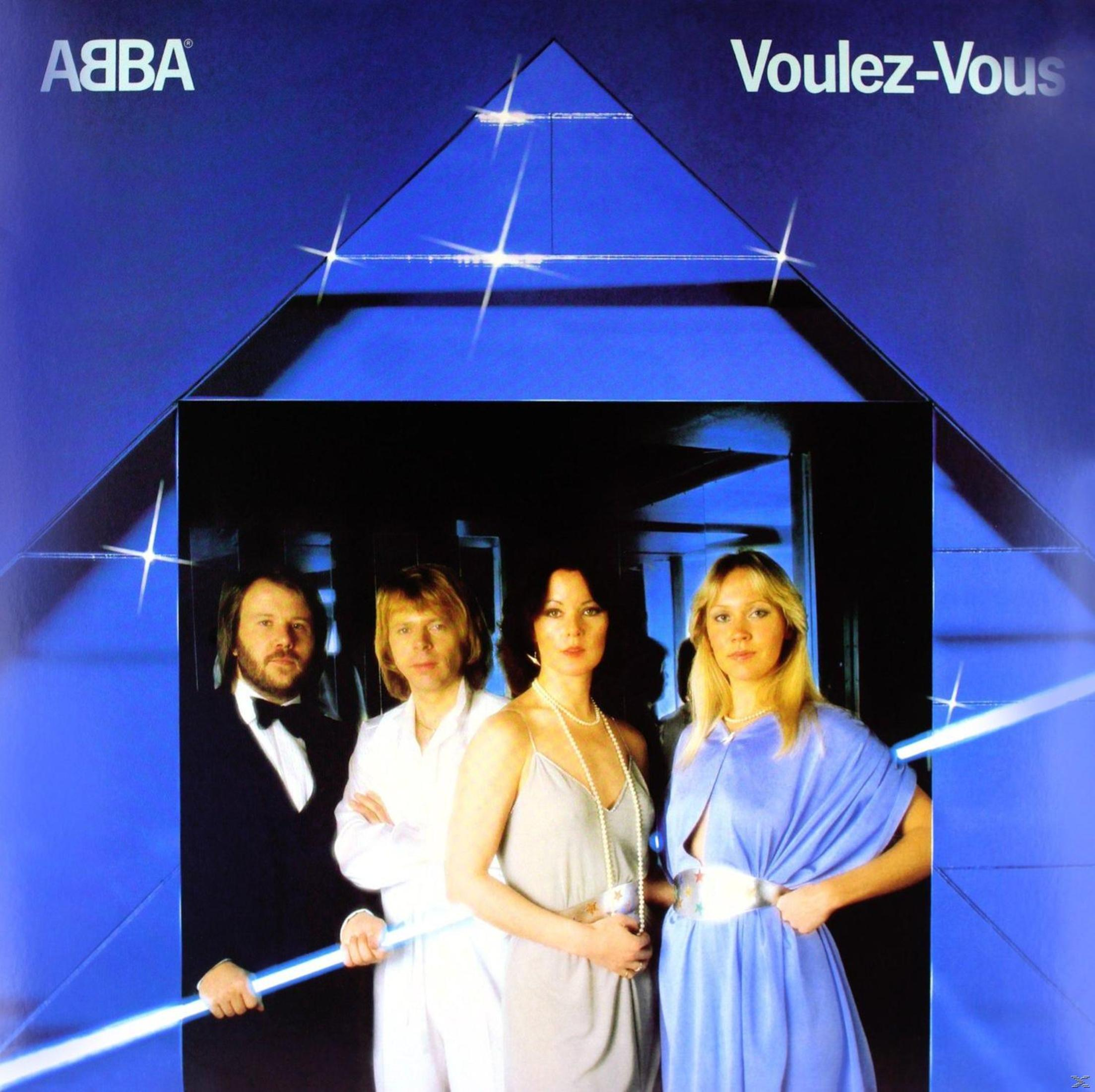 Copertina dell'album degli ABBA con i membri della band che posano in un triangolo, con uno sfondo blu.