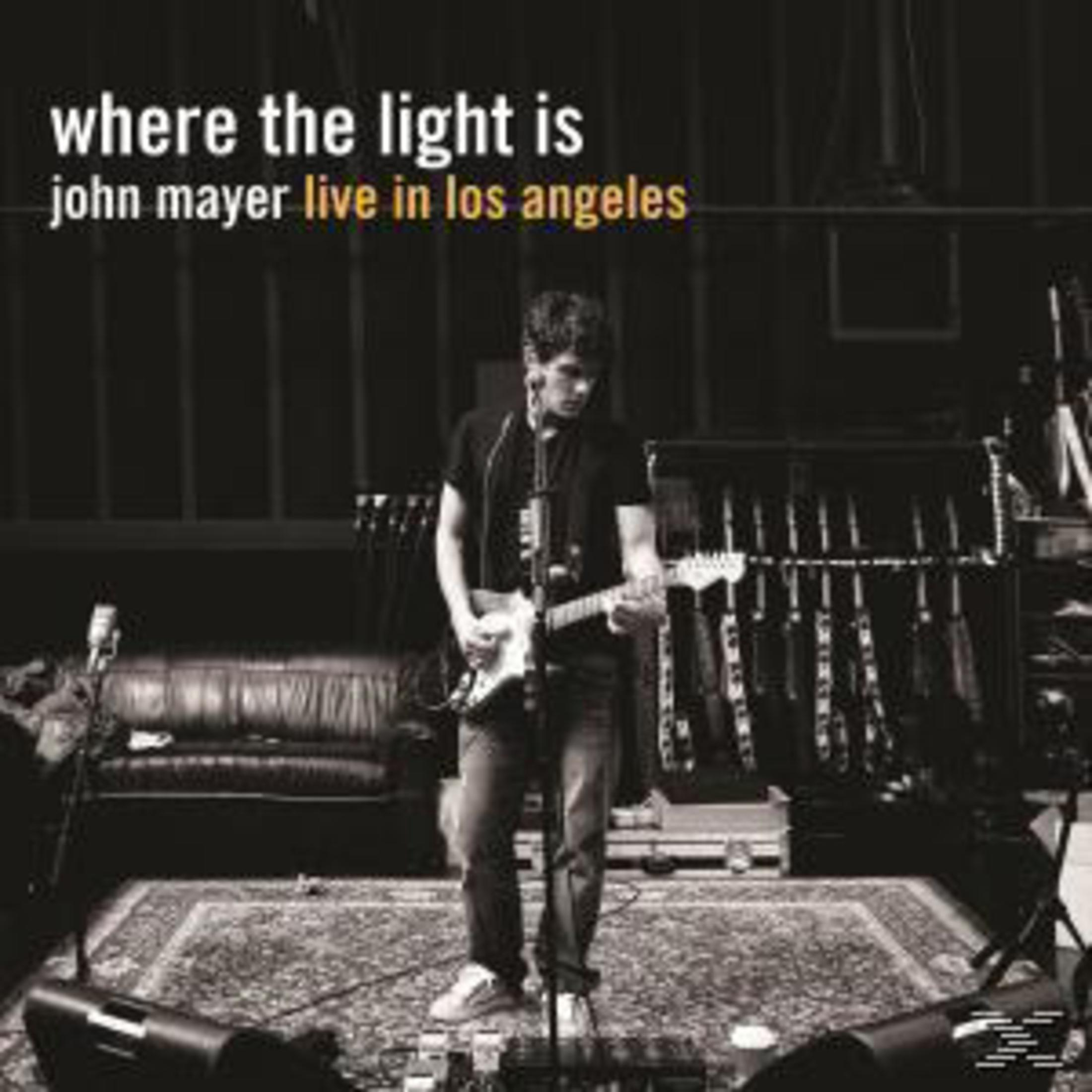 Albumcover von John Mayer, der Gitarre spielt. Er steht auf einer Bühne mit einer Gitarre vor einer Band.