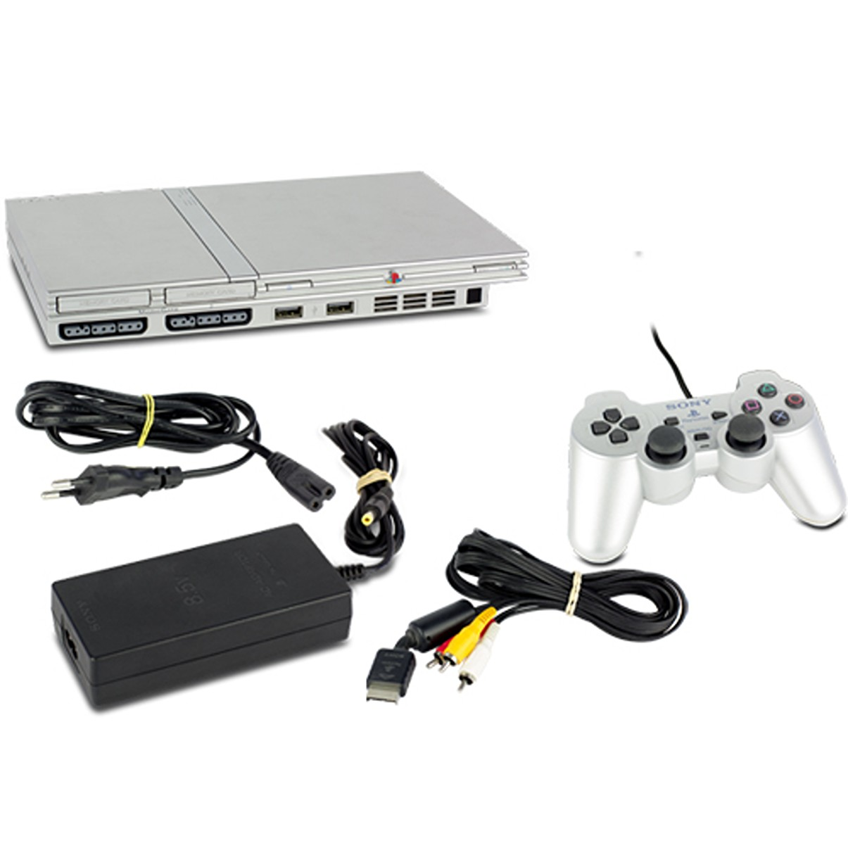 Silberne PlayStation 2 Konsole mit Zubehör: Controller, Netzteil, Kabel.