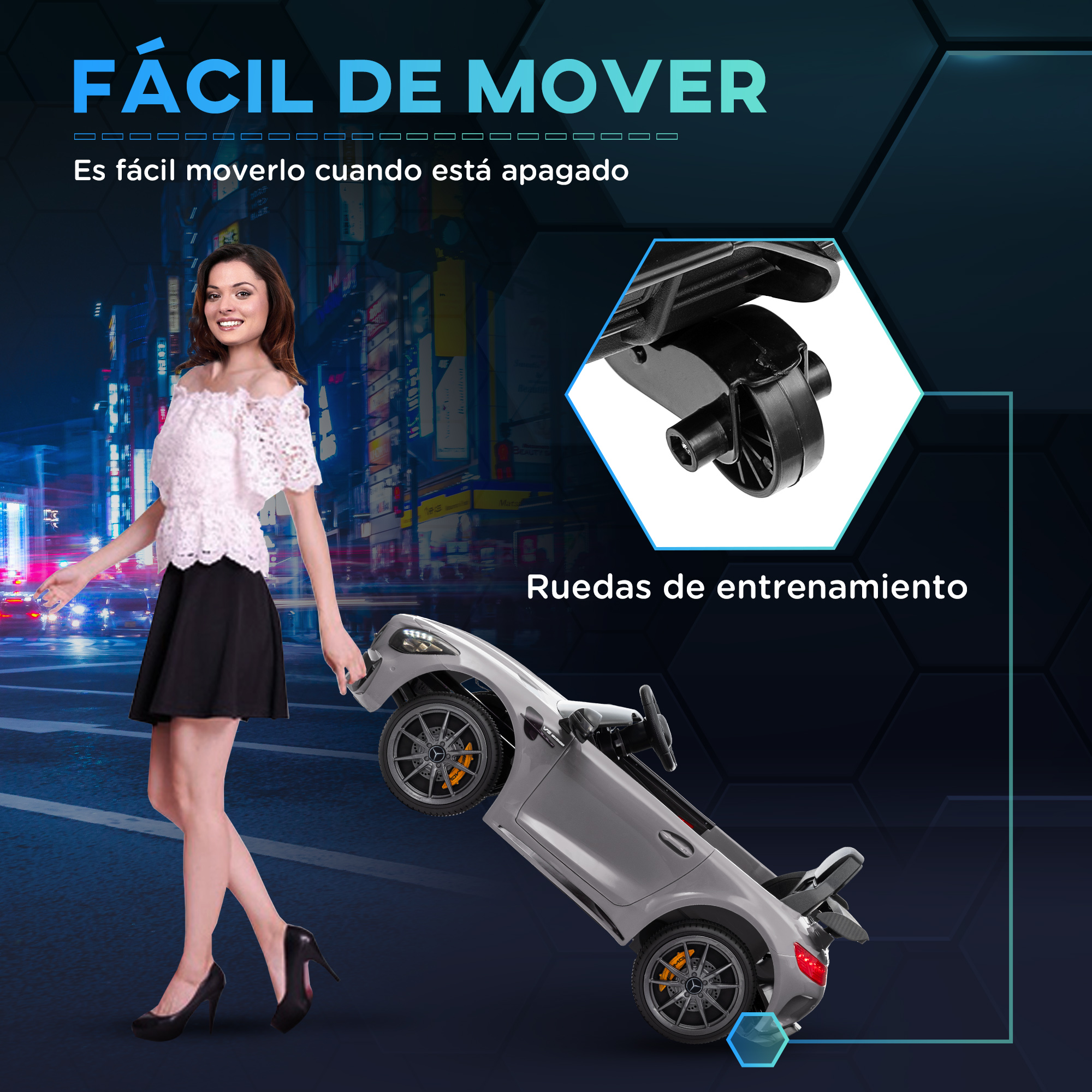 Una mujer empujando un coche de juguete gris, que está inclinado. Tiene ruedas de entrenamiento.