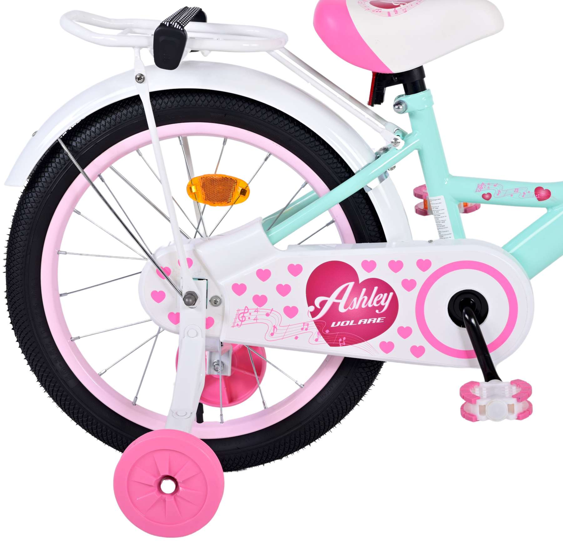 Rosa-weißes Fahrrad mit Stützrädern. Hat ein Herz-Design auf dem Kettenschutz.
