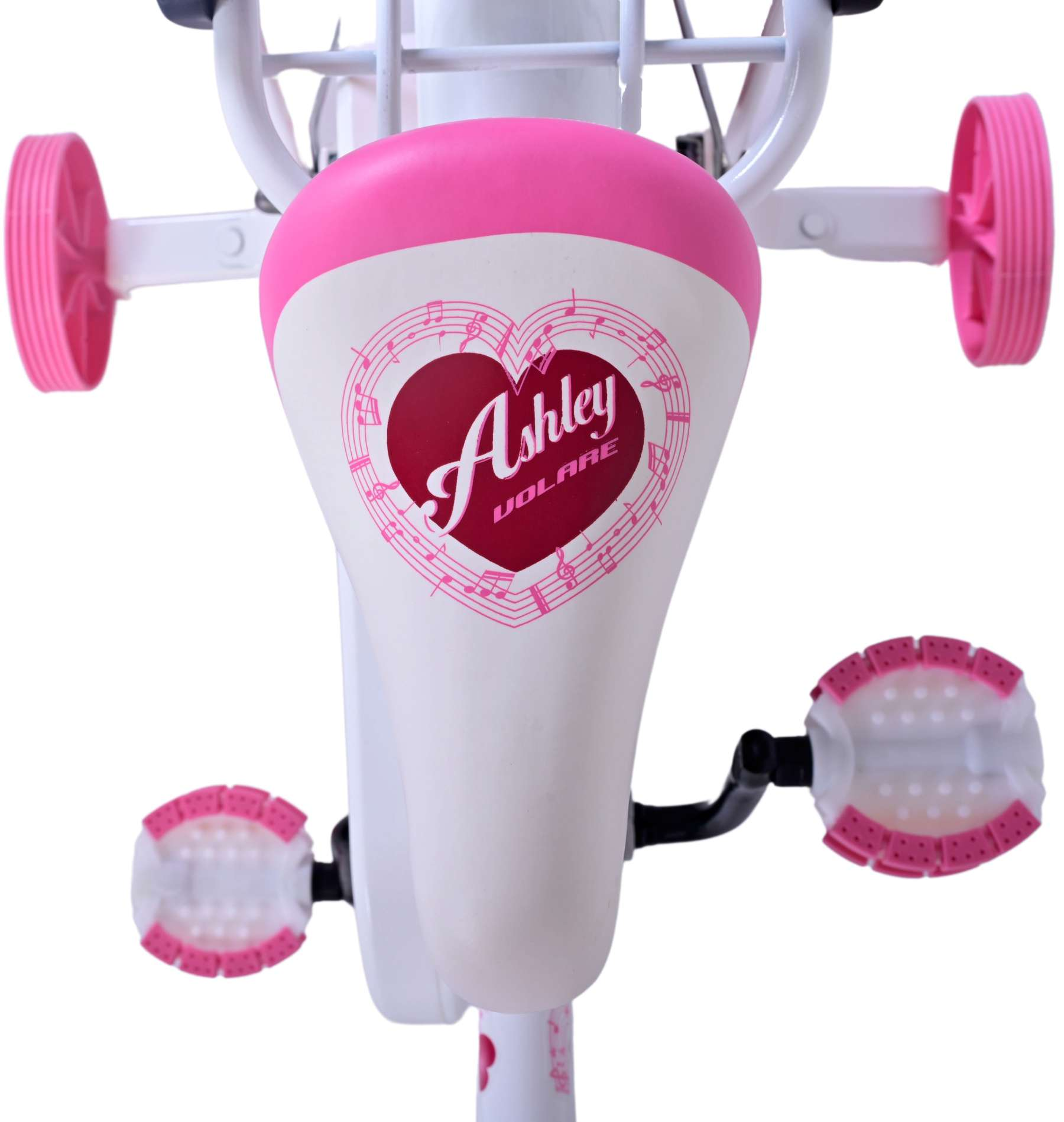 Nahaufnahme eines weißen und rosa Volare-Fahrradsattels mit Herzdesign und rosa Pedalen.