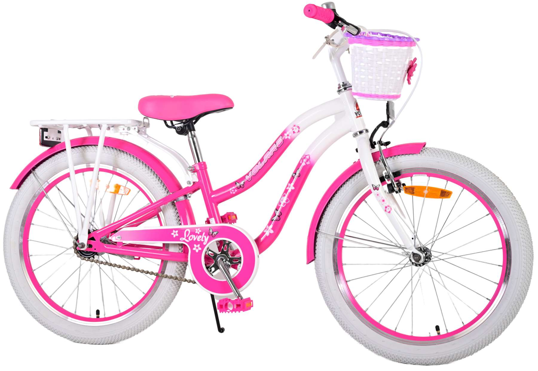 Rosa-weißes Kinderfahrrad mit Korb. Es hat Stützräder.