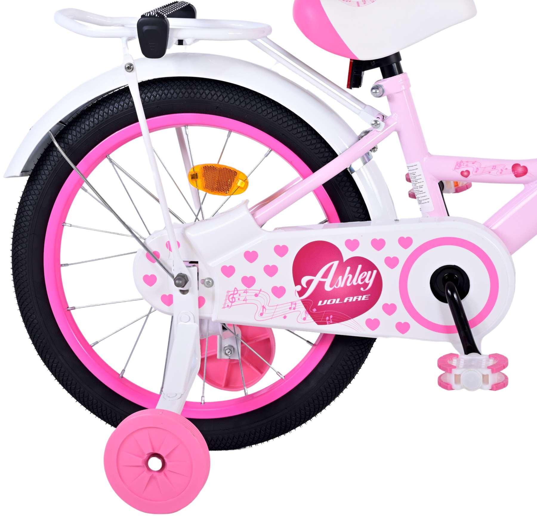 Nahaufnahme eines rosa-weißen Fahrradrads mit Stützrad.