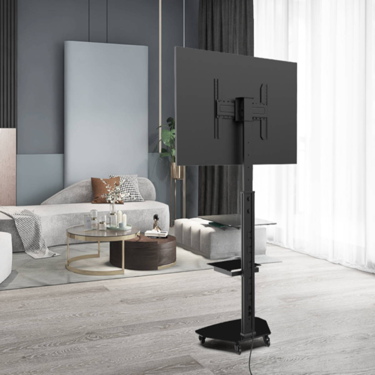 Zwarte tv-standaard met tv in een woonkamer. Grijze en witte kleuren.