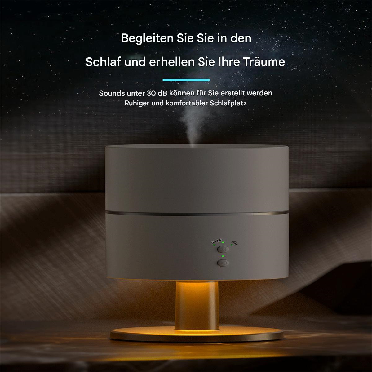 Ein grauer Luftbefeuchter mit Dampfausstoß, platziert auf einer Holzoberfläche vor Sternenhintergrund.