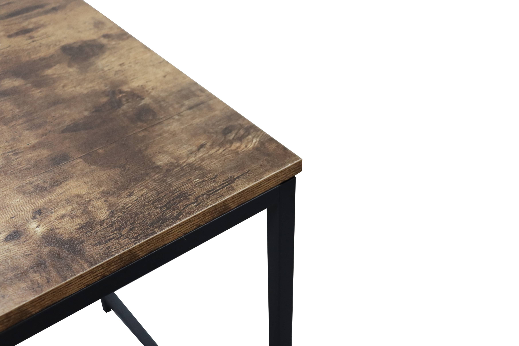 Nahaufnahme einer Holztischecke mit schwarzem Metallrahmen. Das Holz hat eine rustikale, braune Oberfläche.