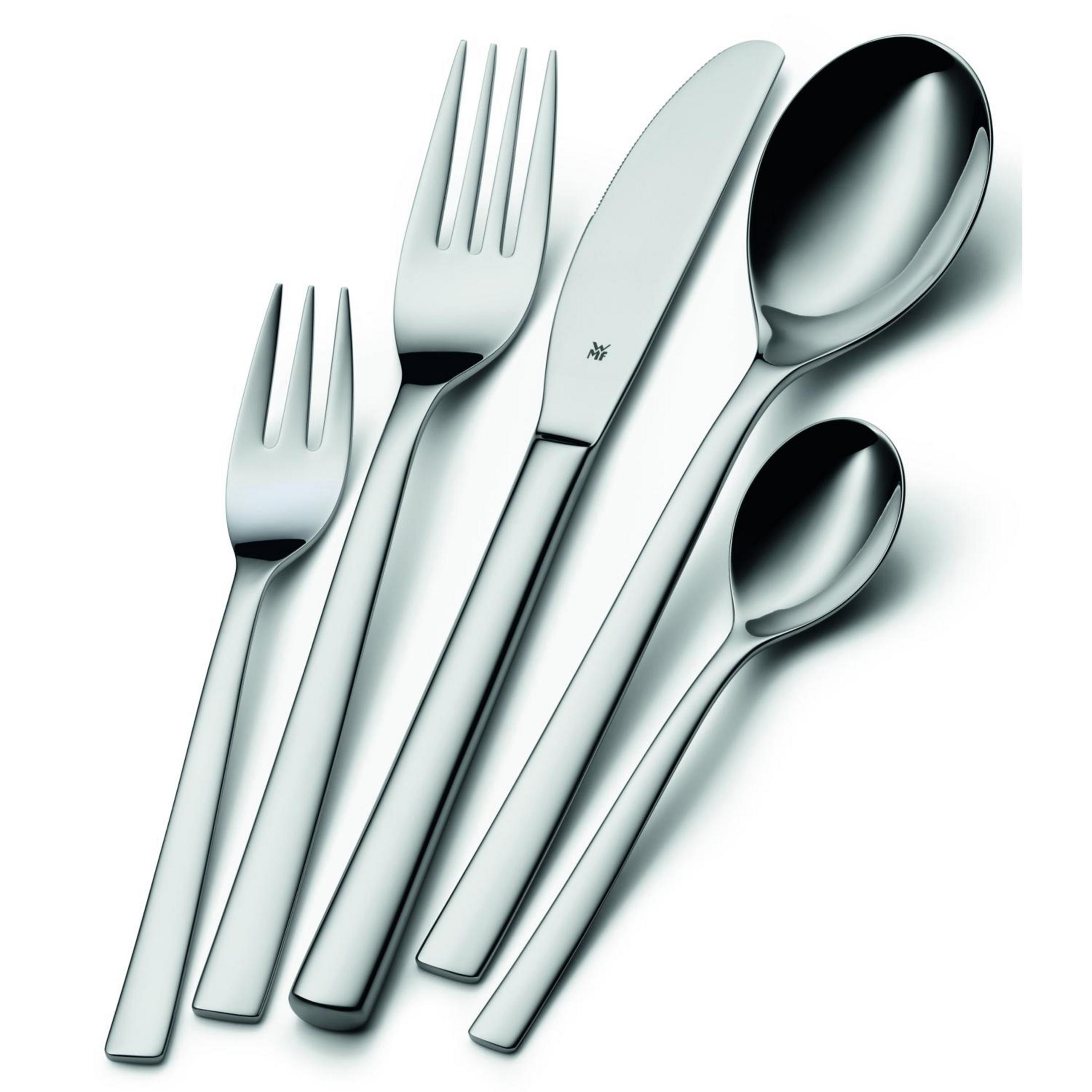 Srebrny zestaw sztućców: dwa widelce, nóż i dwie łyżki. Zestaw na białym tle.