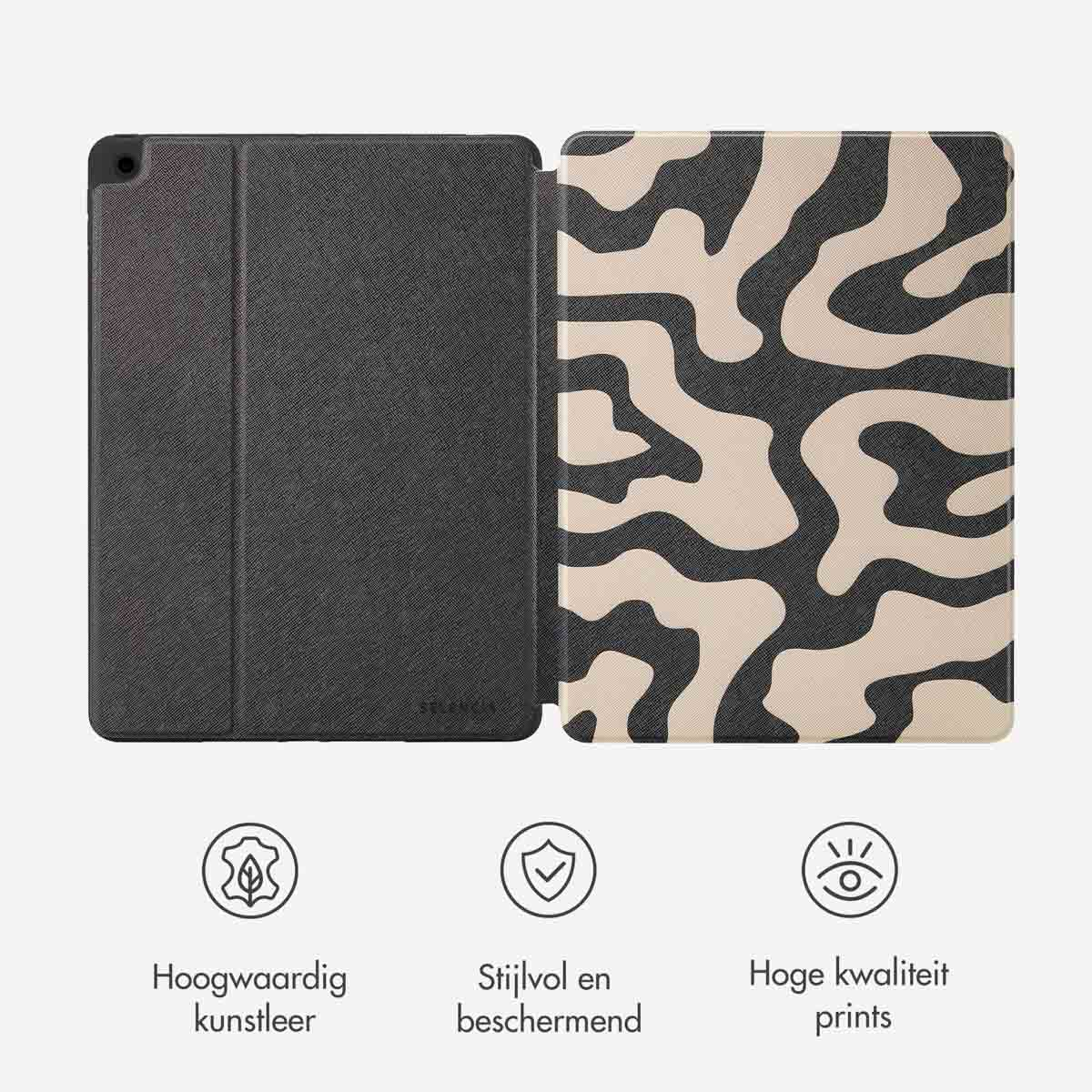 Tablet case open, showing a pattern on the inside.