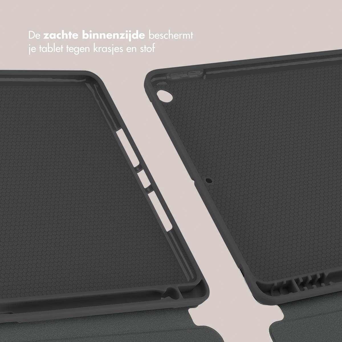 Tablet case interior. It is dark gray with a honeycomb pattern. The case is open.