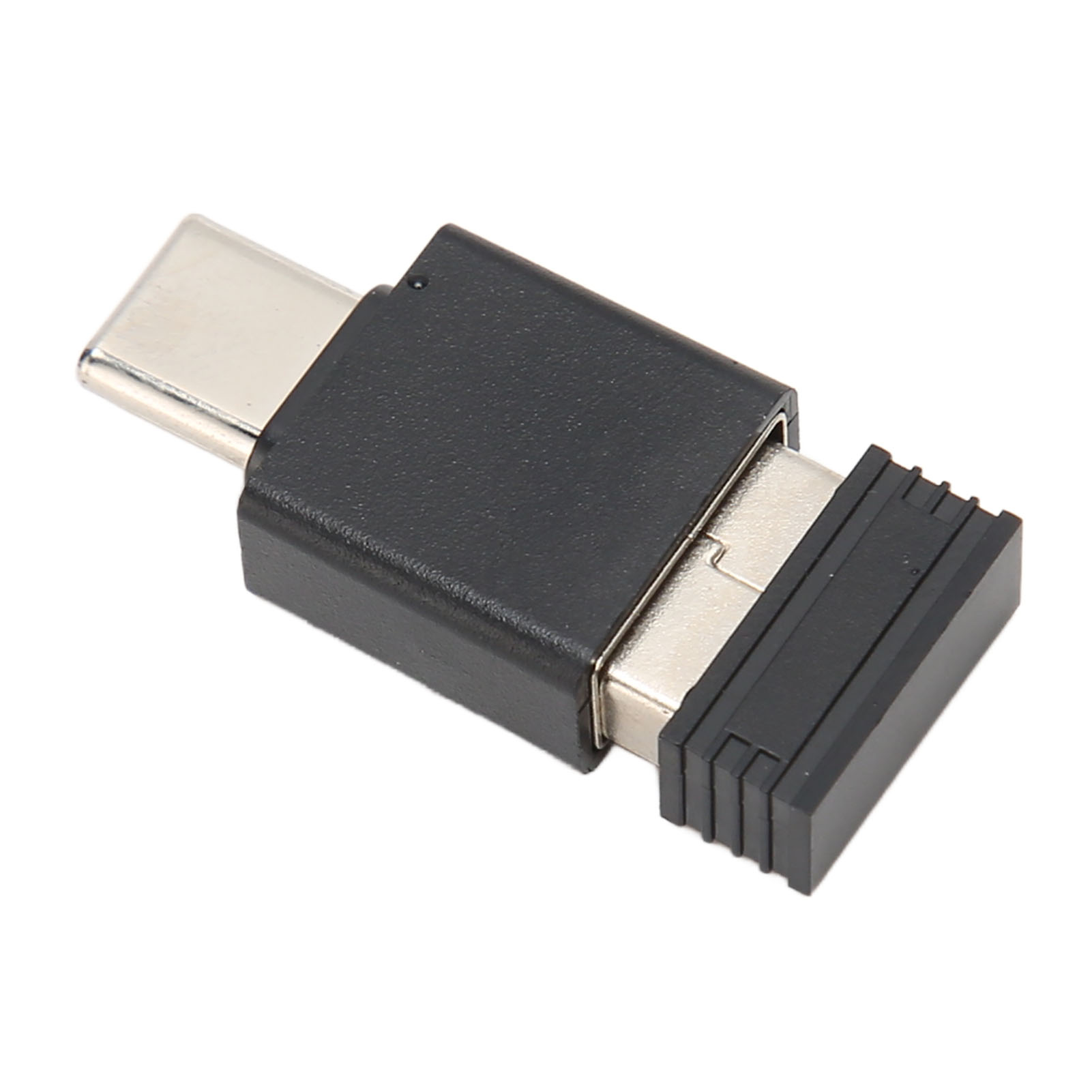 Schwarzer USB-C-zu-USB-Adapter. Ein Ende ist USB-C, das andere ist USB. Auf weißer Oberfläche.