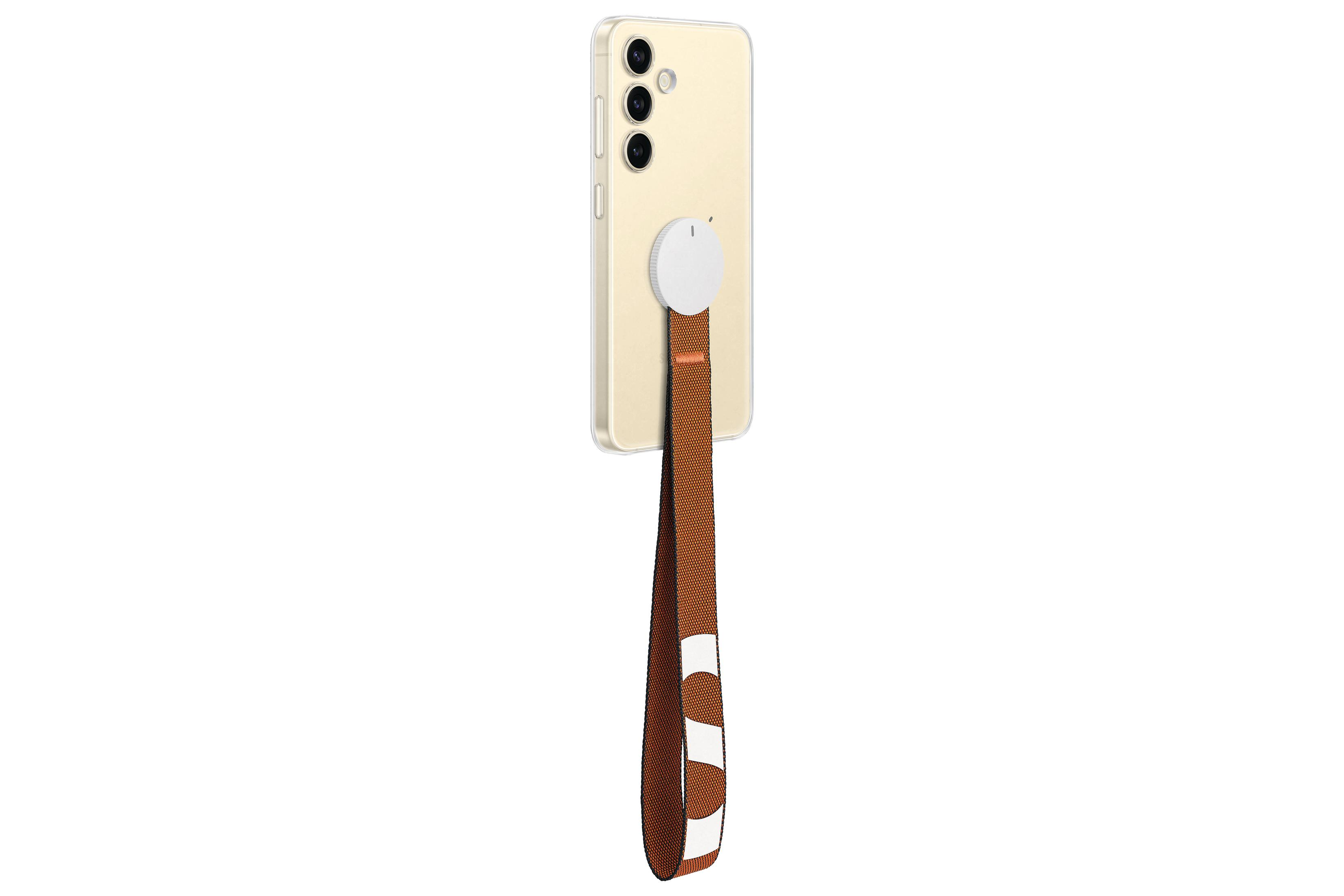 Téléphone avec étui transparent, un pop socket blanc et une sangle marron et blanche attachée.