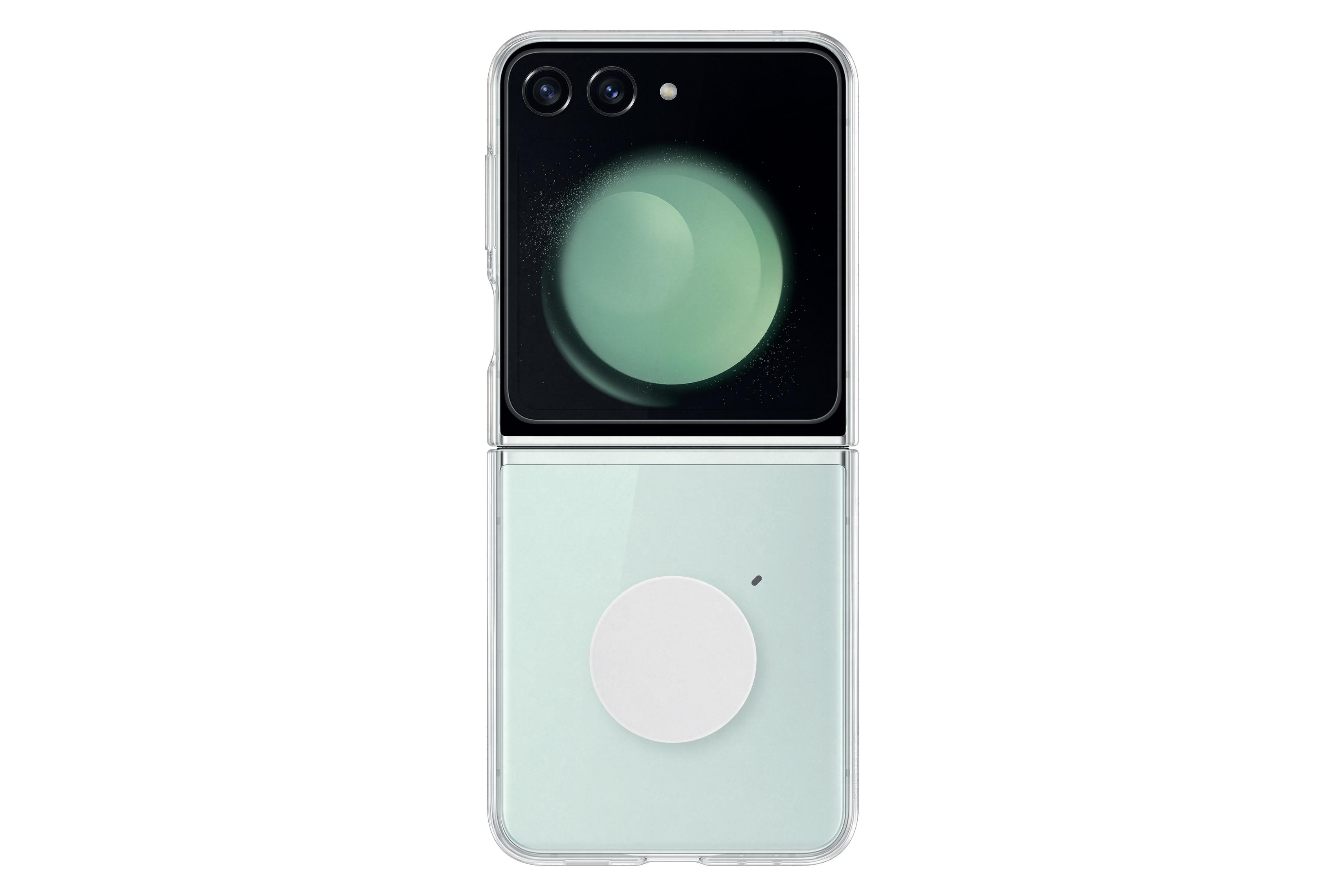Teléfono verde menta plegado con un elemento circular blanco en la mitad inferior.