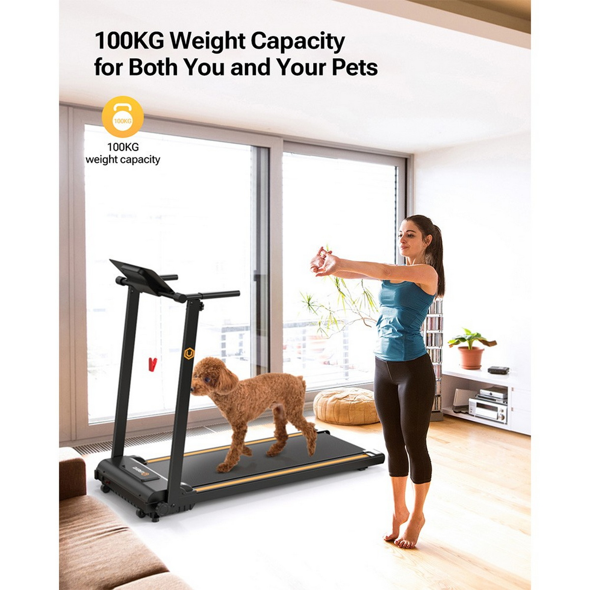 Kobieta i pies na bieżni. Tekst: Udźwig 100 KG.