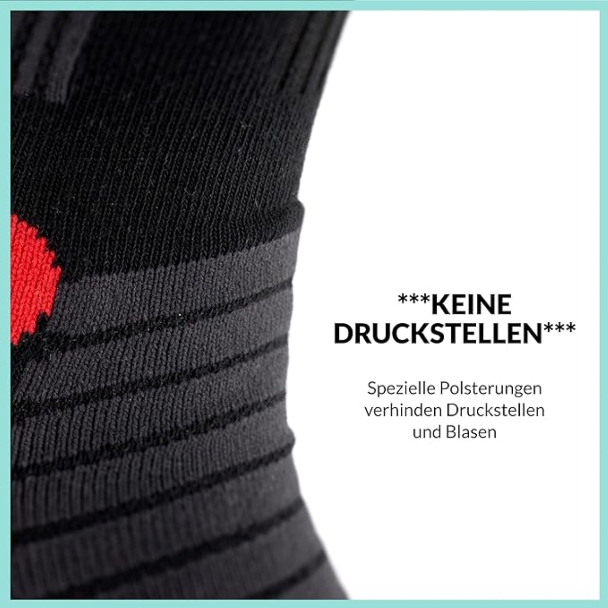 Nahaufnahme einer schwarzen Socke mit roten Akzenten. Text auf Deutsch: KEINE DRUCKSTELLEN.