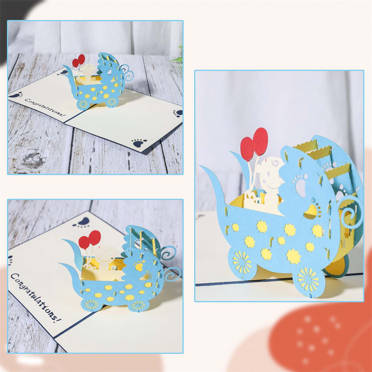 Drei Baby-Pop-up-Karten. Eine ist geöffnet und zeigt einen blauen Kinderwagen.