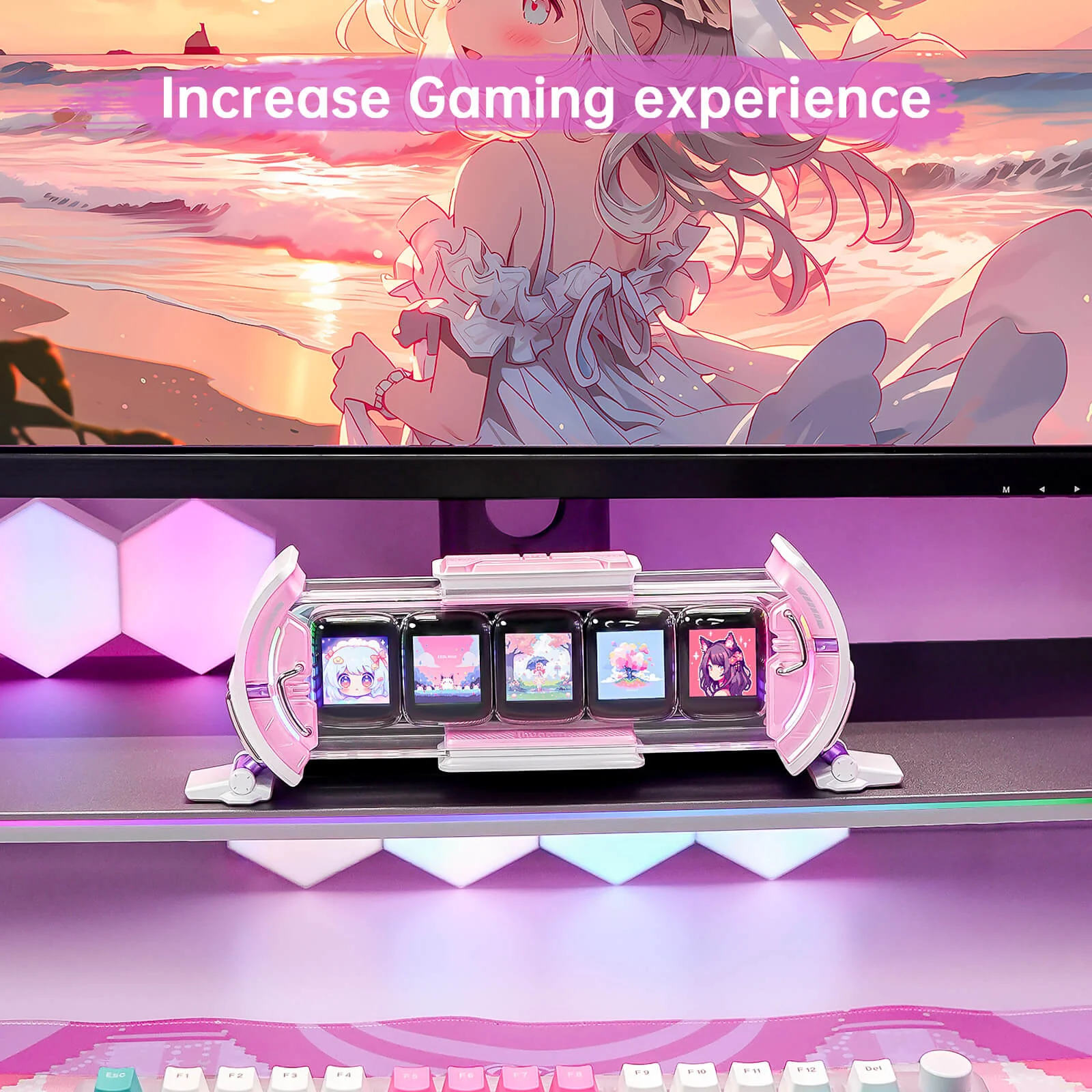 Anime tarzı bir görüntü gösteren bir monitör ve pembe bir klavye ile bir masa kurulumu.
