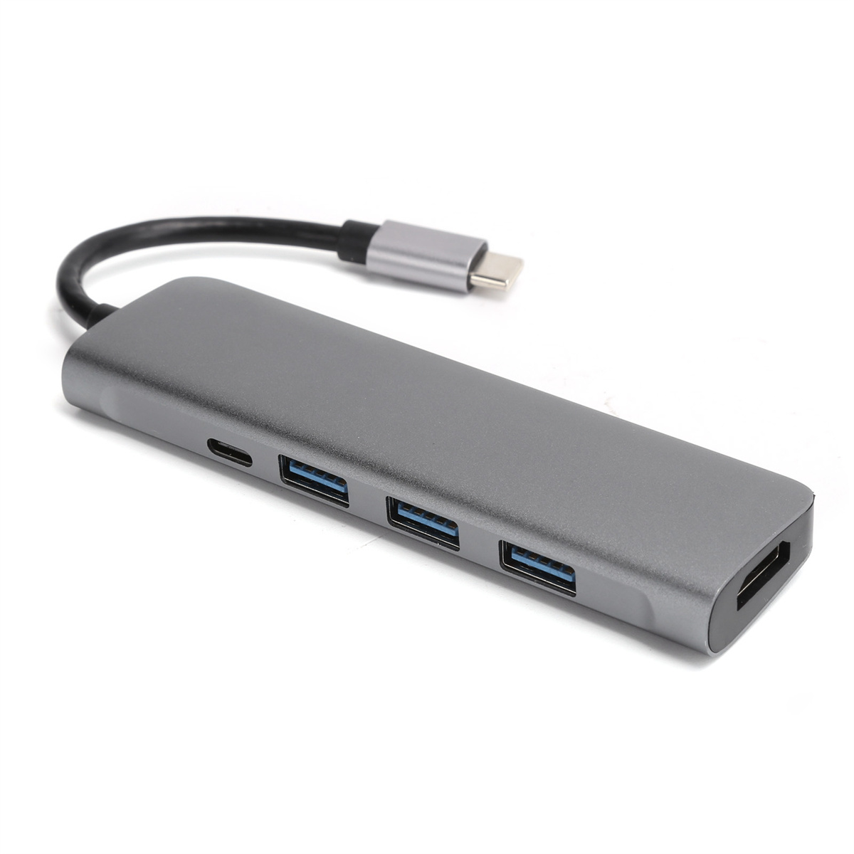 Ein grauer USB-C-Hub mit mehreren USB-Anschlüssen. Ein USB-C-Kabel ist mit dem Hub verbunden.