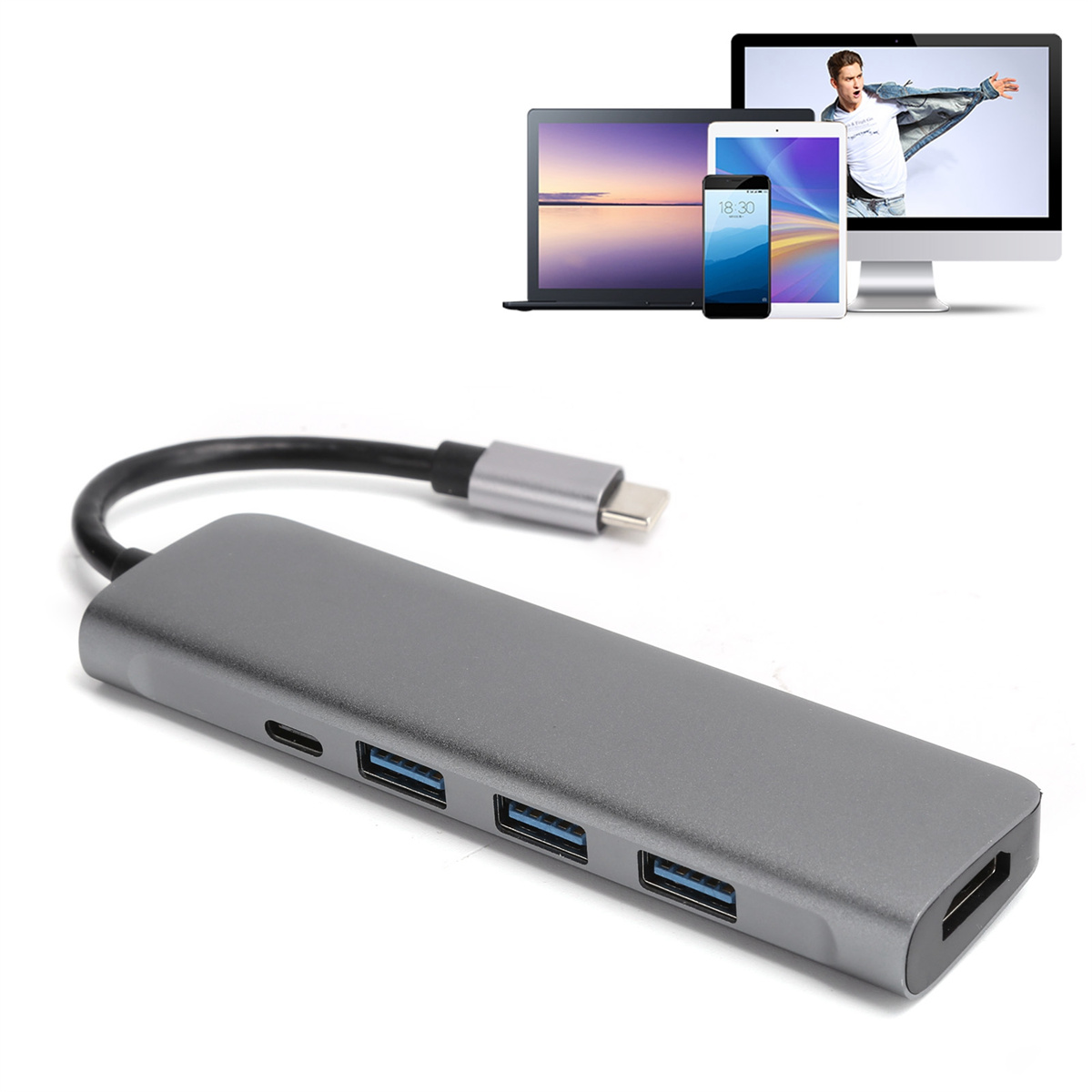 Ein grauer USB-Hub, der mit mehreren Bildschirmen und Geräten verbunden ist.